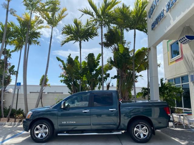2007 Majestic Blue /Graphite/Titanium Nissan Titan LE 1 OWNER LOW MILES 39,670 CREW CAB (1N6BA07A67N) with an 5.6L DOHC 32-Valve V8 FFV Engine engine, Automatic transmission, located at 4701 North Dixie Hwy, Pompano Beach, FL, 33064, (954) 422-2889, 26.240938, -80.123474 - OUR WEBPAGE FLORIDACARS1.COM HAS OVER 100 PHOTOS AND FREE CARFAX LINK 2007 NISSAN TITAN LE FFV 1 OWNER CREW CAB LEATHER VIN: 1N6BA07A67N215171 1 N 6 B A 0 7 A 6 7 N 2 1 5 1 7 1 CREW PICKUP 5.6L V8 F DOHC 32V FLEX FUEL 19 MPG REAR WHEEL DRIVE Features ABS Brakes Air Conditioning Alloy Wheels AM/FM St - Photo#4