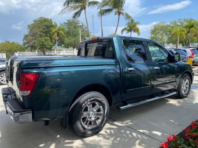 2007 Majestic Blue /Graphite/Titanium Nissan Titan LE 1 OWNER LOW MILES 39,670 CREW CAB (1N6BA07A67N) with an 5.6L DOHC 32-Valve V8 FFV Engine engine, Automatic transmission, located at 4701 North Dixie Hwy, Pompano Beach, FL, 33064, (954) 422-2889, 26.240938, -80.123474 - OUR WEBPAGE FLORIDACARS1.COM HAS OVER 100 PHOTOS AND FREE CARFAX LINK 2007 NISSAN TITAN LE FFV 1 OWNER CREW CAB LEATHER VIN: 1N6BA07A67N215171 1 N 6 B A 0 7 A 6 7 N 2 1 5 1 7 1 CREW PICKUP 5.6L V8 F DOHC 32V FLEX FUEL 19 MPG REAR WHEEL DRIVE Features ABS Brakes Air Conditioning Alloy Wheels AM/FM St - Photo#7