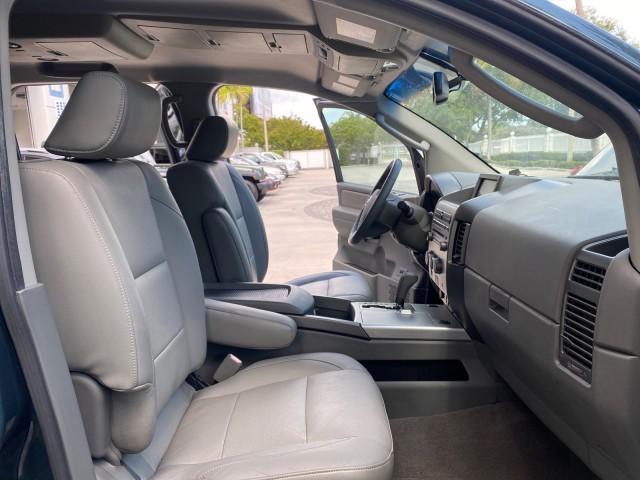 2007 Majestic Blue /Graphite/Titanium Nissan Titan LE 1 OWNER LOW MILES 39,670 CREW CAB (1N6BA07A67N) with an 5.6L DOHC 32-Valve V8 FFV Engine engine, Automatic transmission, located at 4701 North Dixie Hwy, Pompano Beach, FL, 33064, (954) 422-2889, 26.240938, -80.123474 - OUR WEBPAGE FLORIDACARS1.COM HAS OVER 100 PHOTOS AND FREE CARFAX LINK 2007 NISSAN TITAN LE FFV 1 OWNER CREW CAB LEATHER VIN: 1N6BA07A67N215171 1 N 6 B A 0 7 A 6 7 N 2 1 5 1 7 1 CREW PICKUP 5.6L V8 F DOHC 32V FLEX FUEL 19 MPG REAR WHEEL DRIVE Features ABS Brakes Air Conditioning Alloy Wheels AM/FM St - Photo#12