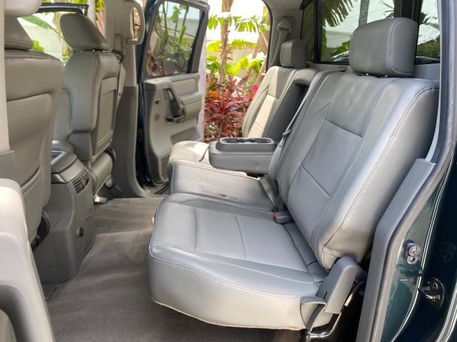 2007 Majestic Blue /Graphite/Titanium Nissan Titan LE 1 OWNER LOW MILES 39,670 CREW CAB (1N6BA07A67N) with an 5.6L DOHC 32-Valve V8 FFV Engine engine, Automatic transmission, located at 4701 North Dixie Hwy, Pompano Beach, FL, 33064, (954) 422-2889, 26.240938, -80.123474 - OUR WEBPAGE FLORIDACARS1.COM HAS OVER 100 PHOTOS AND FREE CARFAX LINK 2007 NISSAN TITAN LE FFV 1 OWNER CREW CAB LEATHER VIN: 1N6BA07A67N215171 1 N 6 B A 0 7 A 6 7 N 2 1 5 1 7 1 CREW PICKUP 5.6L V8 F DOHC 32V FLEX FUEL 19 MPG REAR WHEEL DRIVE Features ABS Brakes Air Conditioning Alloy Wheels AM/FM St - Photo#14