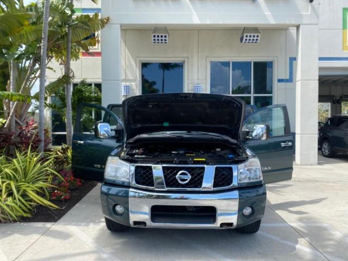 2007 Majestic Blue /Graphite/Titanium Nissan Titan LE 1 OWNER LOW MILES 39,670 CREW CAB (1N6BA07A67N) with an 5.6L DOHC 32-Valve V8 FFV Engine engine, Automatic transmission, located at 4701 North Dixie Hwy, Pompano Beach, FL, 33064, (954) 422-2889, 26.240938, -80.123474 - OUR WEBPAGE FLORIDACARS1.COM HAS OVER 100 PHOTOS AND FREE CARFAX LINK 2007 NISSAN TITAN LE FFV 1 OWNER CREW CAB LEATHER VIN: 1N6BA07A67N215171 1 N 6 B A 0 7 A 6 7 N 2 1 5 1 7 1 CREW PICKUP 5.6L V8 F DOHC 32V FLEX FUEL 19 MPG REAR WHEEL DRIVE Features ABS Brakes Air Conditioning Alloy Wheels AM/FM St - Photo#16