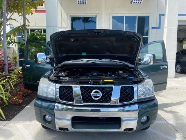 2007 Majestic Blue /Graphite/Titanium Nissan Titan LE 1 OWNER LOW MILES 39,670 CREW CAB (1N6BA07A67N) with an 5.6L DOHC 32-Valve V8 FFV Engine engine, Automatic transmission, located at 4701 North Dixie Hwy, Pompano Beach, FL, 33064, (954) 422-2889, 26.240938, -80.123474 - OUR WEBPAGE FLORIDACARS1.COM HAS OVER 100 PHOTOS AND FREE CARFAX LINK 2007 NISSAN TITAN LE FFV 1 OWNER CREW CAB LEATHER VIN: 1N6BA07A67N215171 1 N 6 B A 0 7 A 6 7 N 2 1 5 1 7 1 CREW PICKUP 5.6L V8 F DOHC 32V FLEX FUEL 19 MPG REAR WHEEL DRIVE Features ABS Brakes Air Conditioning Alloy Wheels AM/FM St - Photo#17