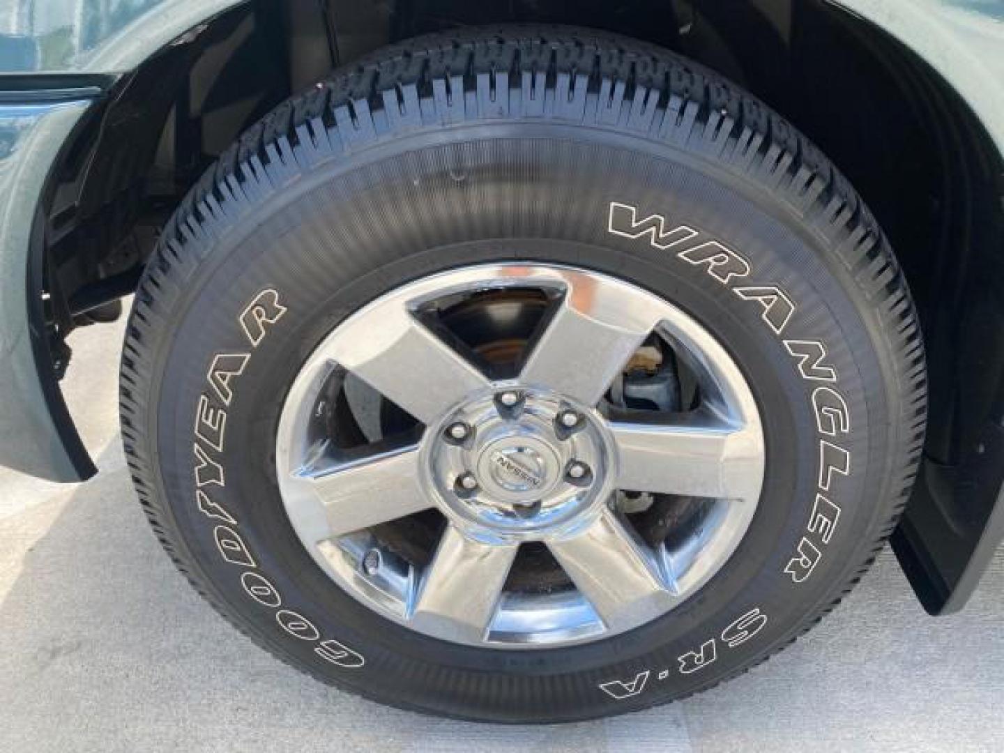 2007 Majestic Blue /Graphite/Titanium Nissan Titan LE 1 OWNER LOW MILES 39,670 CREW CAB (1N6BA07A67N) with an 5.6L DOHC 32-Valve V8 FFV Engine engine, Automatic transmission, located at 4701 North Dixie Hwy, Pompano Beach, FL, 33064, (954) 422-2889, 26.240938, -80.123474 - OUR WEBPAGE FLORIDACARS1.COM HAS OVER 100 PHOTOS AND FREE CARFAX LINK 2007 NISSAN TITAN LE FFV 1 OWNER CREW CAB LEATHER VIN: 1N6BA07A67N215171 1 N 6 B A 0 7 A 6 7 N 2 1 5 1 7 1 CREW PICKUP 5.6L V8 F DOHC 32V FLEX FUEL 19 MPG REAR WHEEL DRIVE Features ABS Brakes Air Conditioning Alloy Wheels AM/FM St - Photo#19