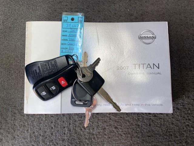 2007 Majestic Blue /Graphite/Titanium Nissan Titan LE 1 OWNER LOW MILES 39,670 CREW CAB (1N6BA07A67N) with an 5.6L DOHC 32-Valve V8 FFV Engine engine, Automatic transmission, located at 4701 North Dixie Hwy, Pompano Beach, FL, 33064, (954) 422-2889, 26.240938, -80.123474 - OUR WEBPAGE FLORIDACARS1.COM HAS OVER 100 PHOTOS AND FREE CARFAX LINK 2007 NISSAN TITAN LE FFV 1 OWNER CREW CAB LEATHER VIN: 1N6BA07A67N215171 1 N 6 B A 0 7 A 6 7 N 2 1 5 1 7 1 CREW PICKUP 5.6L V8 F DOHC 32V FLEX FUEL 19 MPG REAR WHEEL DRIVE Features ABS Brakes Air Conditioning Alloy Wheels AM/FM St - Photo#23