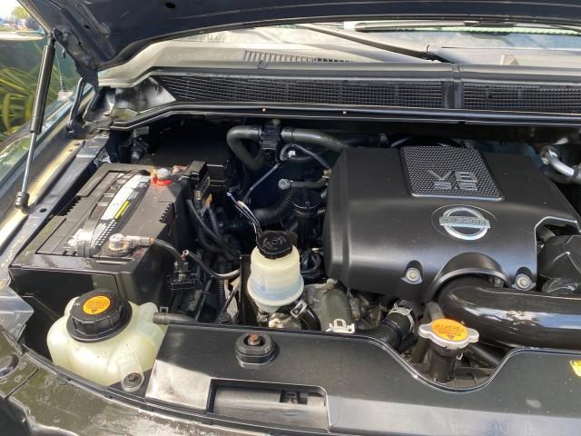 2007 Majestic Blue /Graphite/Titanium Nissan Titan LE 1 OWNER LOW MILES 39,670 CREW CAB (1N6BA07A67N) with an 5.6L DOHC 32-Valve V8 FFV Engine engine, Automatic transmission, located at 4701 North Dixie Hwy, Pompano Beach, FL, 33064, (954) 422-2889, 26.240938, -80.123474 - OUR WEBPAGE FLORIDACARS1.COM HAS OVER 100 PHOTOS AND FREE CARFAX LINK 2007 NISSAN TITAN LE FFV 1 OWNER CREW CAB LEATHER VIN: 1N6BA07A67N215171 1 N 6 B A 0 7 A 6 7 N 2 1 5 1 7 1 CREW PICKUP 5.6L V8 F DOHC 32V FLEX FUEL 19 MPG REAR WHEEL DRIVE Features ABS Brakes Air Conditioning Alloy Wheels AM/FM St - Photo#24