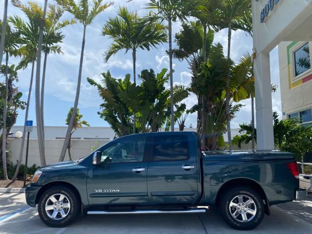 2007 Majestic Blue /Graphite/Titanium Nissan Titan LE 1 OWNER LOW MILES 39,670 CREW CAB (1N6BA07A67N) with an 5.6L DOHC 32-Valve V8 FFV Engine engine, Automatic transmission, located at 4701 North Dixie Hwy, Pompano Beach, FL, 33064, (954) 422-2889, 26.240938, -80.123474 - OUR WEBPAGE FLORIDACARS1.COM HAS OVER 100 PHOTOS AND FREE CARFAX LINK 2007 NISSAN TITAN LE FFV 1 OWNER CREW CAB LEATHER VIN: 1N6BA07A67N215171 1 N 6 B A 0 7 A 6 7 N 2 1 5 1 7 1 CREW PICKUP 5.6L V8 F DOHC 32V FLEX FUEL 19 MPG REAR WHEEL DRIVE Features ABS Brakes Air Conditioning Alloy Wheels AM/FM St - Photo#30