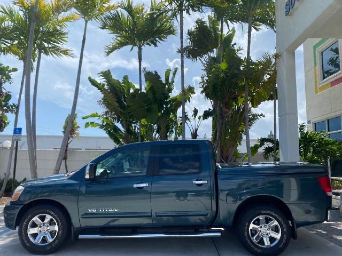 2007 Majestic Blue /Graphite/Titanium Nissan Titan LE 1 OWNER LOW MILES 39,670 CREW CAB (1N6BA07A67N) with an 5.6L DOHC 32-Valve V8 FFV Engine engine, Automatic transmission, located at 4701 North Dixie Hwy, Pompano Beach, FL, 33064, (954) 422-2889, 26.240938, -80.123474 - OUR WEBPAGE FLORIDACARS1.COM HAS OVER 100 PHOTOS AND FREE CARFAX LINK 2007 NISSAN TITAN LE FFV 1 OWNER CREW CAB LEATHER VIN: 1N6BA07A67N215171 1 N 6 B A 0 7 A 6 7 N 2 1 5 1 7 1 CREW PICKUP 5.6L V8 F DOHC 32V FLEX FUEL 19 MPG REAR WHEEL DRIVE Features ABS Brakes Air Conditioning Alloy Wheels AM/FM St - Photo#31