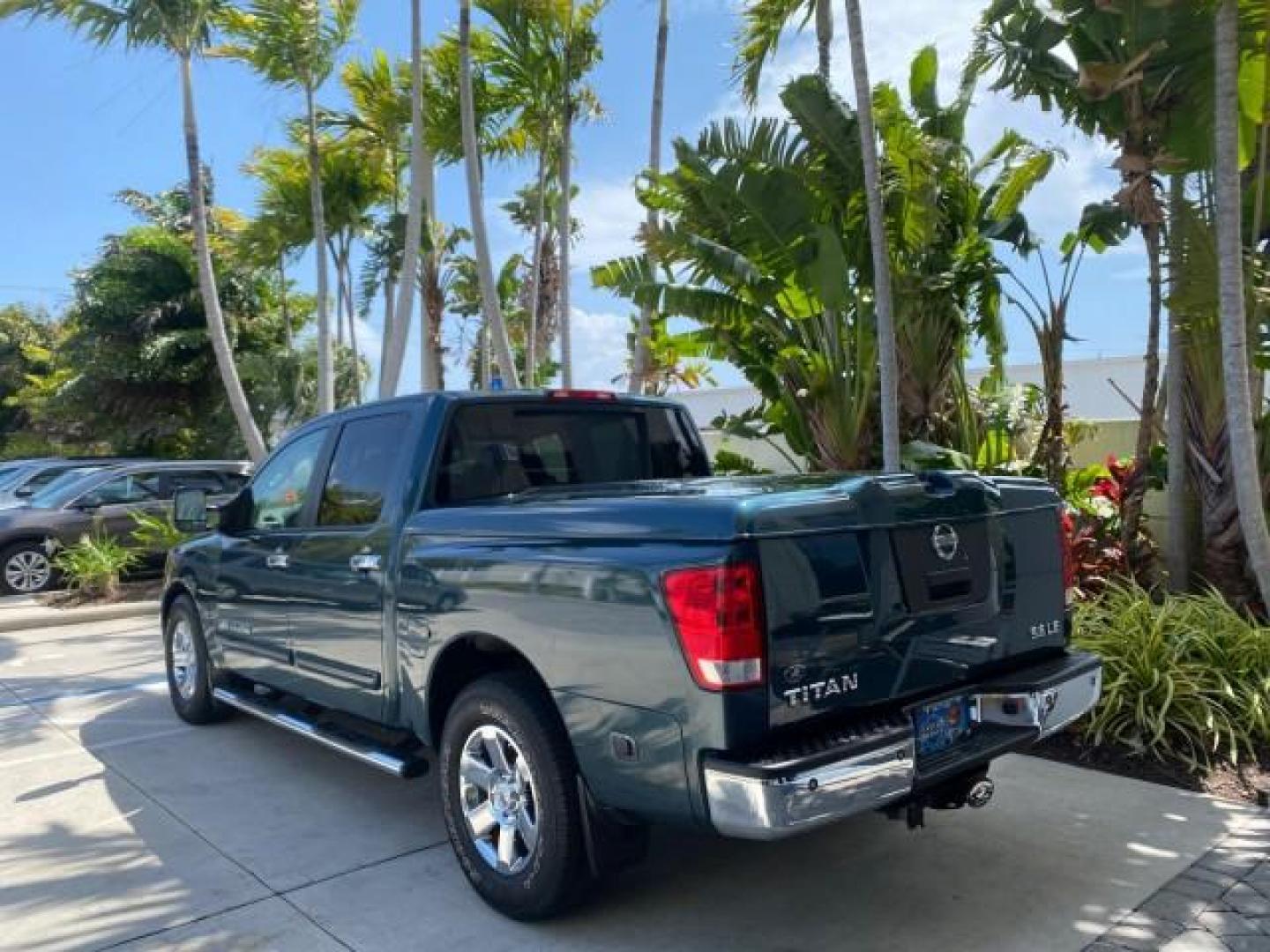 2007 Majestic Blue /Graphite/Titanium Nissan Titan LE 1 OWNER LOW MILES 39,670 CREW CAB (1N6BA07A67N) with an 5.6L DOHC 32-Valve V8 FFV Engine engine, Automatic transmission, located at 4701 North Dixie Hwy, Pompano Beach, FL, 33064, (954) 422-2889, 26.240938, -80.123474 - OUR WEBPAGE FLORIDACARS1.COM HAS OVER 100 PHOTOS AND FREE CARFAX LINK 2007 NISSAN TITAN LE FFV 1 OWNER CREW CAB LEATHER VIN: 1N6BA07A67N215171 1 N 6 B A 0 7 A 6 7 N 2 1 5 1 7 1 CREW PICKUP 5.6L V8 F DOHC 32V FLEX FUEL 19 MPG REAR WHEEL DRIVE Features ABS Brakes Air Conditioning Alloy Wheels AM/FM St - Photo#32