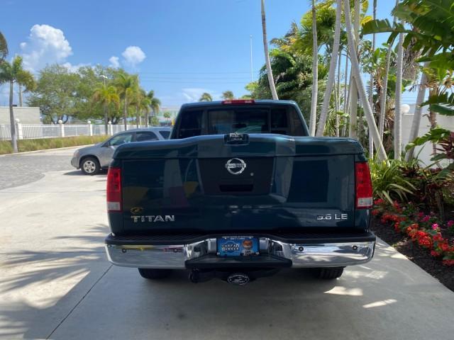 2007 Majestic Blue /Graphite/Titanium Nissan Titan LE 1 OWNER LOW MILES 39,670 CREW CAB (1N6BA07A67N) with an 5.6L DOHC 32-Valve V8 FFV Engine engine, Automatic transmission, located at 4701 North Dixie Hwy, Pompano Beach, FL, 33064, (954) 422-2889, 26.240938, -80.123474 - OUR WEBPAGE FLORIDACARS1.COM HAS OVER 100 PHOTOS AND FREE CARFAX LINK 2007 NISSAN TITAN LE FFV 1 OWNER CREW CAB LEATHER VIN: 1N6BA07A67N215171 1 N 6 B A 0 7 A 6 7 N 2 1 5 1 7 1 CREW PICKUP 5.6L V8 F DOHC 32V FLEX FUEL 19 MPG REAR WHEEL DRIVE Features ABS Brakes Air Conditioning Alloy Wheels AM/FM St - Photo#34