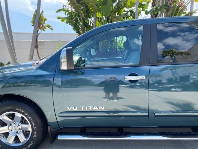 2007 Majestic Blue /Graphite/Titanium Nissan Titan LE 1 OWNER LOW MILES 39,670 CREW CAB (1N6BA07A67N) with an 5.6L DOHC 32-Valve V8 FFV Engine engine, Automatic transmission, located at 4701 North Dixie Hwy, Pompano Beach, FL, 33064, (954) 422-2889, 26.240938, -80.123474 - OUR WEBPAGE FLORIDACARS1.COM HAS OVER 100 PHOTOS AND FREE CARFAX LINK 2007 NISSAN TITAN LE FFV 1 OWNER CREW CAB LEATHER VIN: 1N6BA07A67N215171 1 N 6 B A 0 7 A 6 7 N 2 1 5 1 7 1 CREW PICKUP 5.6L V8 F DOHC 32V FLEX FUEL 19 MPG REAR WHEEL DRIVE Features ABS Brakes Air Conditioning Alloy Wheels AM/FM St - Photo#37