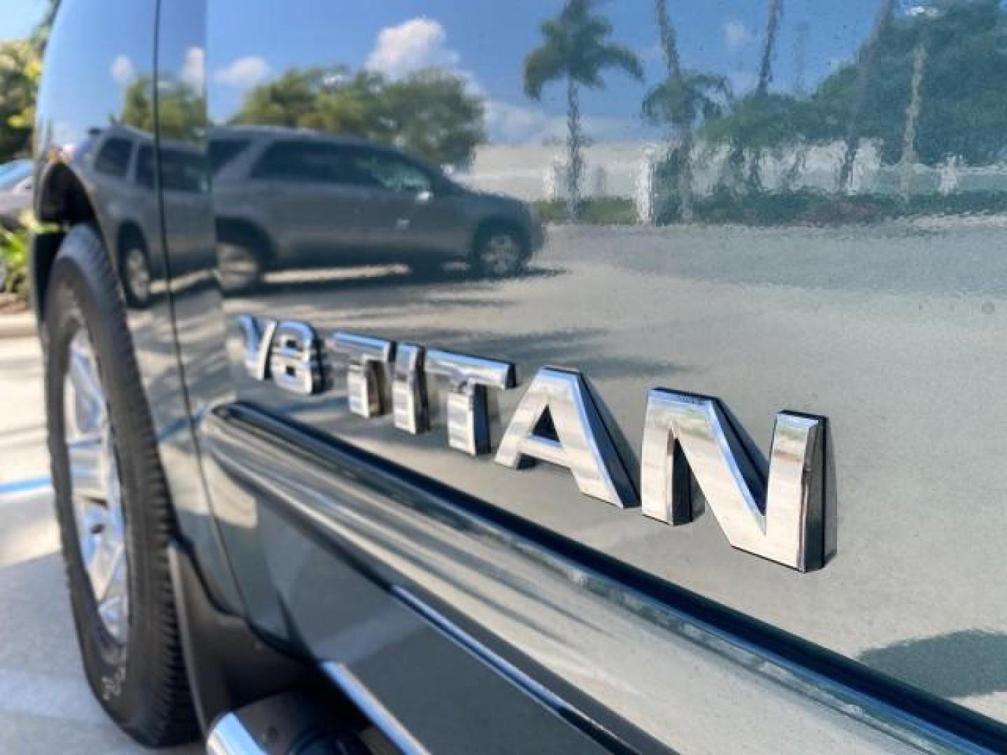 2007 Majestic Blue /Graphite/Titanium Nissan Titan LE 1 OWNER LOW MILES 39,670 CREW CAB (1N6BA07A67N) with an 5.6L DOHC 32-Valve V8 FFV Engine engine, Automatic transmission, located at 4701 North Dixie Hwy, Pompano Beach, FL, 33064, (954) 422-2889, 26.240938, -80.123474 - OUR WEBPAGE FLORIDACARS1.COM HAS OVER 100 PHOTOS AND FREE CARFAX LINK 2007 NISSAN TITAN LE FFV 1 OWNER CREW CAB LEATHER VIN: 1N6BA07A67N215171 1 N 6 B A 0 7 A 6 7 N 2 1 5 1 7 1 CREW PICKUP 5.6L V8 F DOHC 32V FLEX FUEL 19 MPG REAR WHEEL DRIVE Features ABS Brakes Air Conditioning Alloy Wheels AM/FM St - Photo#39
