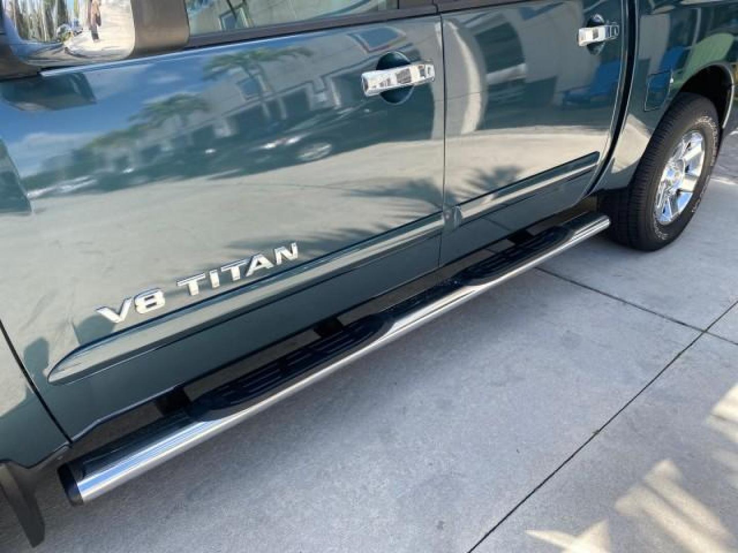 2007 Majestic Blue /Graphite/Titanium Nissan Titan LE 1 OWNER LOW MILES 39,670 CREW CAB (1N6BA07A67N) with an 5.6L DOHC 32-Valve V8 FFV Engine engine, Automatic transmission, located at 4701 North Dixie Hwy, Pompano Beach, FL, 33064, (954) 422-2889, 26.240938, -80.123474 - OUR WEBPAGE FLORIDACARS1.COM HAS OVER 100 PHOTOS AND FREE CARFAX LINK 2007 NISSAN TITAN LE FFV 1 OWNER CREW CAB LEATHER VIN: 1N6BA07A67N215171 1 N 6 B A 0 7 A 6 7 N 2 1 5 1 7 1 CREW PICKUP 5.6L V8 F DOHC 32V FLEX FUEL 19 MPG REAR WHEEL DRIVE Features ABS Brakes Air Conditioning Alloy Wheels AM/FM St - Photo#42