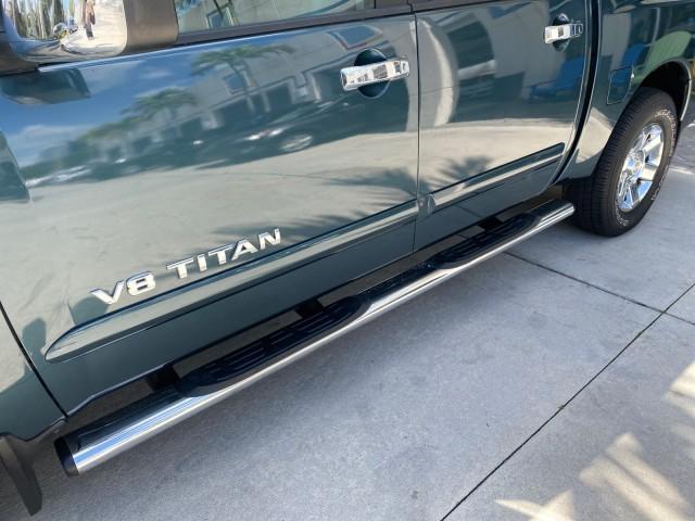 2007 Majestic Blue /Graphite/Titanium Nissan Titan LE 1 OWNER LOW MILES 39,670 CREW CAB (1N6BA07A67N) with an 5.6L DOHC 32-Valve V8 FFV Engine engine, Automatic transmission, located at 4701 North Dixie Hwy, Pompano Beach, FL, 33064, (954) 422-2889, 26.240938, -80.123474 - OUR WEBPAGE FLORIDACARS1.COM HAS OVER 100 PHOTOS AND FREE CARFAX LINK 2007 NISSAN TITAN LE FFV 1 OWNER CREW CAB LEATHER VIN: 1N6BA07A67N215171 1 N 6 B A 0 7 A 6 7 N 2 1 5 1 7 1 CREW PICKUP 5.6L V8 F DOHC 32V FLEX FUEL 19 MPG REAR WHEEL DRIVE Features ABS Brakes Air Conditioning Alloy Wheels AM/FM St - Photo#42