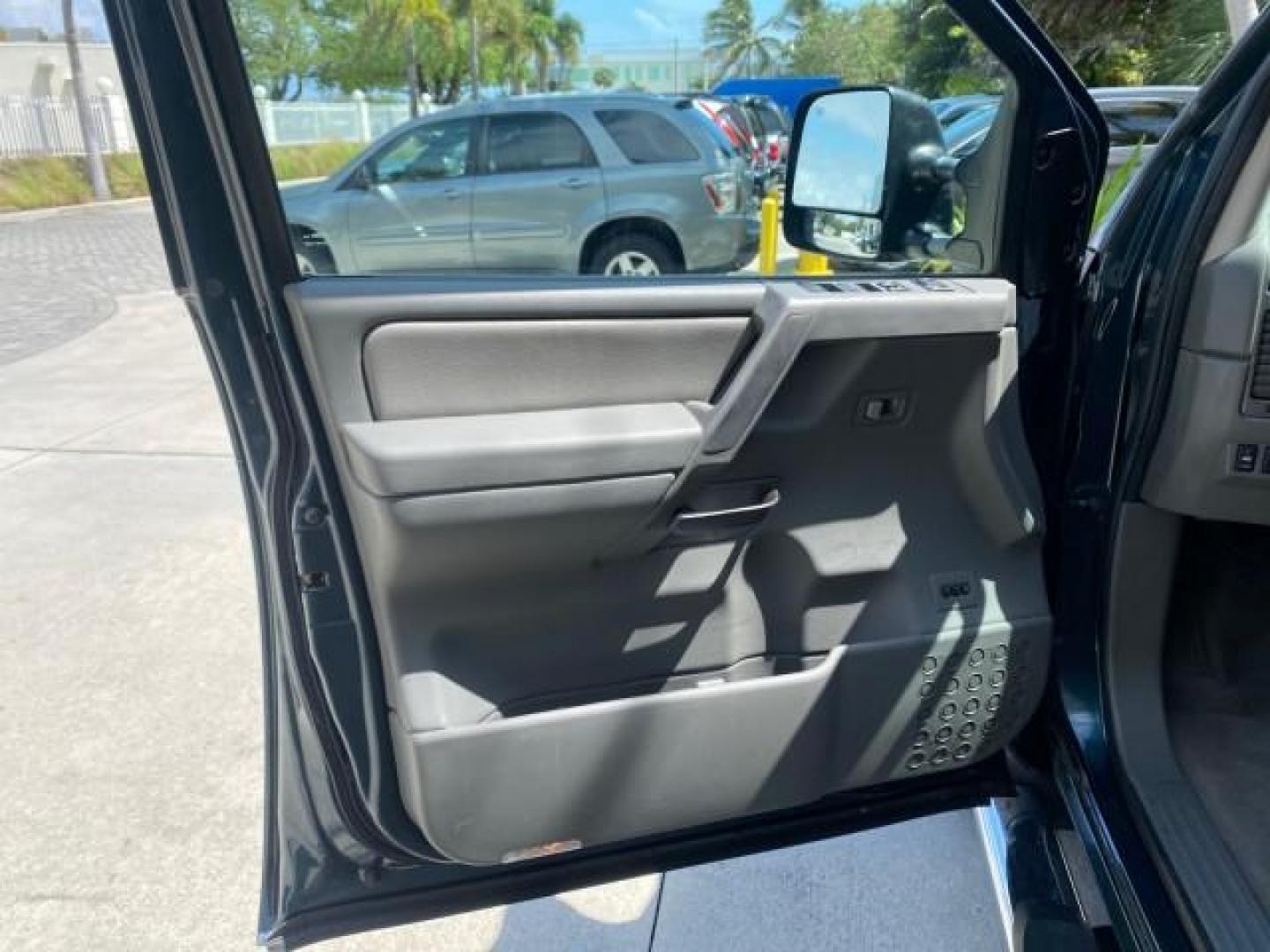 2007 Majestic Blue /Graphite/Titanium Nissan Titan LE 1 OWNER LOW MILES 39,670 CREW CAB (1N6BA07A67N) with an 5.6L DOHC 32-Valve V8 FFV Engine engine, Automatic transmission, located at 4701 North Dixie Hwy, Pompano Beach, FL, 33064, (954) 422-2889, 26.240938, -80.123474 - OUR WEBPAGE FLORIDACARS1.COM HAS OVER 100 PHOTOS AND FREE CARFAX LINK 2007 NISSAN TITAN LE FFV 1 OWNER CREW CAB LEATHER VIN: 1N6BA07A67N215171 1 N 6 B A 0 7 A 6 7 N 2 1 5 1 7 1 CREW PICKUP 5.6L V8 F DOHC 32V FLEX FUEL 19 MPG REAR WHEEL DRIVE Features ABS Brakes Air Conditioning Alloy Wheels AM/FM St - Photo#43