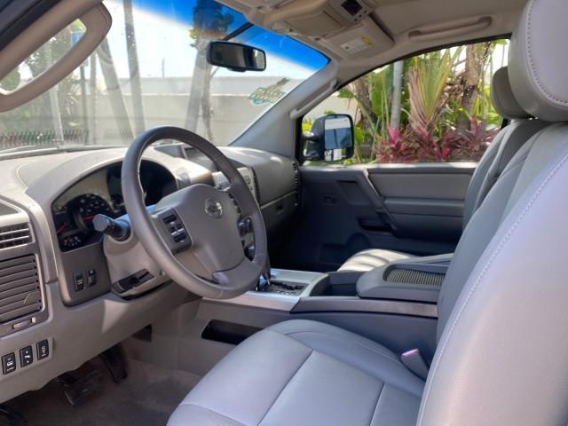 2007 Majestic Blue /Graphite/Titanium Nissan Titan LE 1 OWNER LOW MILES 39,670 CREW CAB (1N6BA07A67N) with an 5.6L DOHC 32-Valve V8 FFV Engine engine, Automatic transmission, located at 4701 North Dixie Hwy, Pompano Beach, FL, 33064, (954) 422-2889, 26.240938, -80.123474 - OUR WEBPAGE FLORIDACARS1.COM HAS OVER 100 PHOTOS AND FREE CARFAX LINK 2007 NISSAN TITAN LE FFV 1 OWNER CREW CAB LEATHER VIN: 1N6BA07A67N215171 1 N 6 B A 0 7 A 6 7 N 2 1 5 1 7 1 CREW PICKUP 5.6L V8 F DOHC 32V FLEX FUEL 19 MPG REAR WHEEL DRIVE Features ABS Brakes Air Conditioning Alloy Wheels AM/FM St - Photo#47