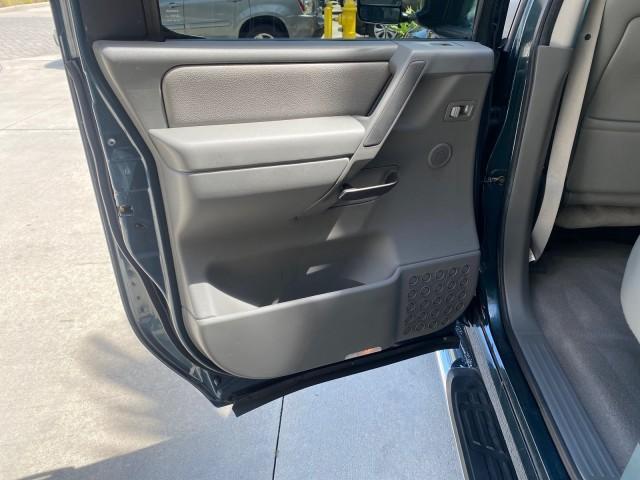 2007 Majestic Blue /Graphite/Titanium Nissan Titan LE 1 OWNER LOW MILES 39,670 CREW CAB (1N6BA07A67N) with an 5.6L DOHC 32-Valve V8 FFV Engine engine, Automatic transmission, located at 4701 North Dixie Hwy, Pompano Beach, FL, 33064, (954) 422-2889, 26.240938, -80.123474 - OUR WEBPAGE FLORIDACARS1.COM HAS OVER 100 PHOTOS AND FREE CARFAX LINK 2007 NISSAN TITAN LE FFV 1 OWNER CREW CAB LEATHER VIN: 1N6BA07A67N215171 1 N 6 B A 0 7 A 6 7 N 2 1 5 1 7 1 CREW PICKUP 5.6L V8 F DOHC 32V FLEX FUEL 19 MPG REAR WHEEL DRIVE Features ABS Brakes Air Conditioning Alloy Wheels AM/FM St - Photo#79