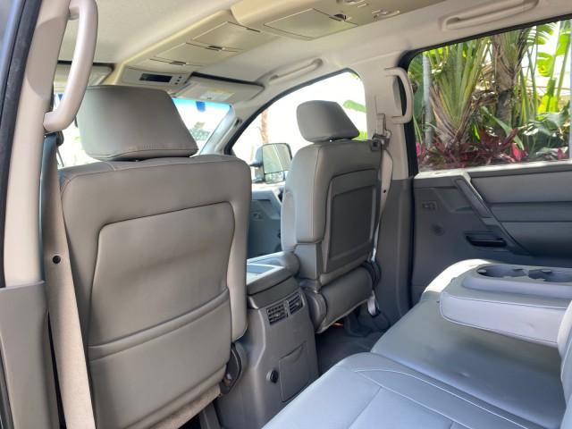 2007 Majestic Blue /Graphite/Titanium Nissan Titan LE 1 OWNER LOW MILES 39,670 CREW CAB (1N6BA07A67N) with an 5.6L DOHC 32-Valve V8 FFV Engine engine, Automatic transmission, located at 4701 North Dixie Hwy, Pompano Beach, FL, 33064, (954) 422-2889, 26.240938, -80.123474 - OUR WEBPAGE FLORIDACARS1.COM HAS OVER 100 PHOTOS AND FREE CARFAX LINK 2007 NISSAN TITAN LE FFV 1 OWNER CREW CAB LEATHER VIN: 1N6BA07A67N215171 1 N 6 B A 0 7 A 6 7 N 2 1 5 1 7 1 CREW PICKUP 5.6L V8 F DOHC 32V FLEX FUEL 19 MPG REAR WHEEL DRIVE Features ABS Brakes Air Conditioning Alloy Wheels AM/FM St - Photo#84