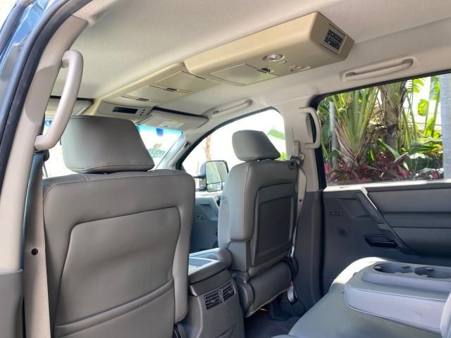 2007 Majestic Blue /Graphite/Titanium Nissan Titan LE 1 OWNER LOW MILES 39,670 CREW CAB (1N6BA07A67N) with an 5.6L DOHC 32-Valve V8 FFV Engine engine, Automatic transmission, located at 4701 North Dixie Hwy, Pompano Beach, FL, 33064, (954) 422-2889, 26.240938, -80.123474 - OUR WEBPAGE FLORIDACARS1.COM HAS OVER 100 PHOTOS AND FREE CARFAX LINK 2007 NISSAN TITAN LE FFV 1 OWNER CREW CAB LEATHER VIN: 1N6BA07A67N215171 1 N 6 B A 0 7 A 6 7 N 2 1 5 1 7 1 CREW PICKUP 5.6L V8 F DOHC 32V FLEX FUEL 19 MPG REAR WHEEL DRIVE Features ABS Brakes Air Conditioning Alloy Wheels AM/FM St - Photo#85