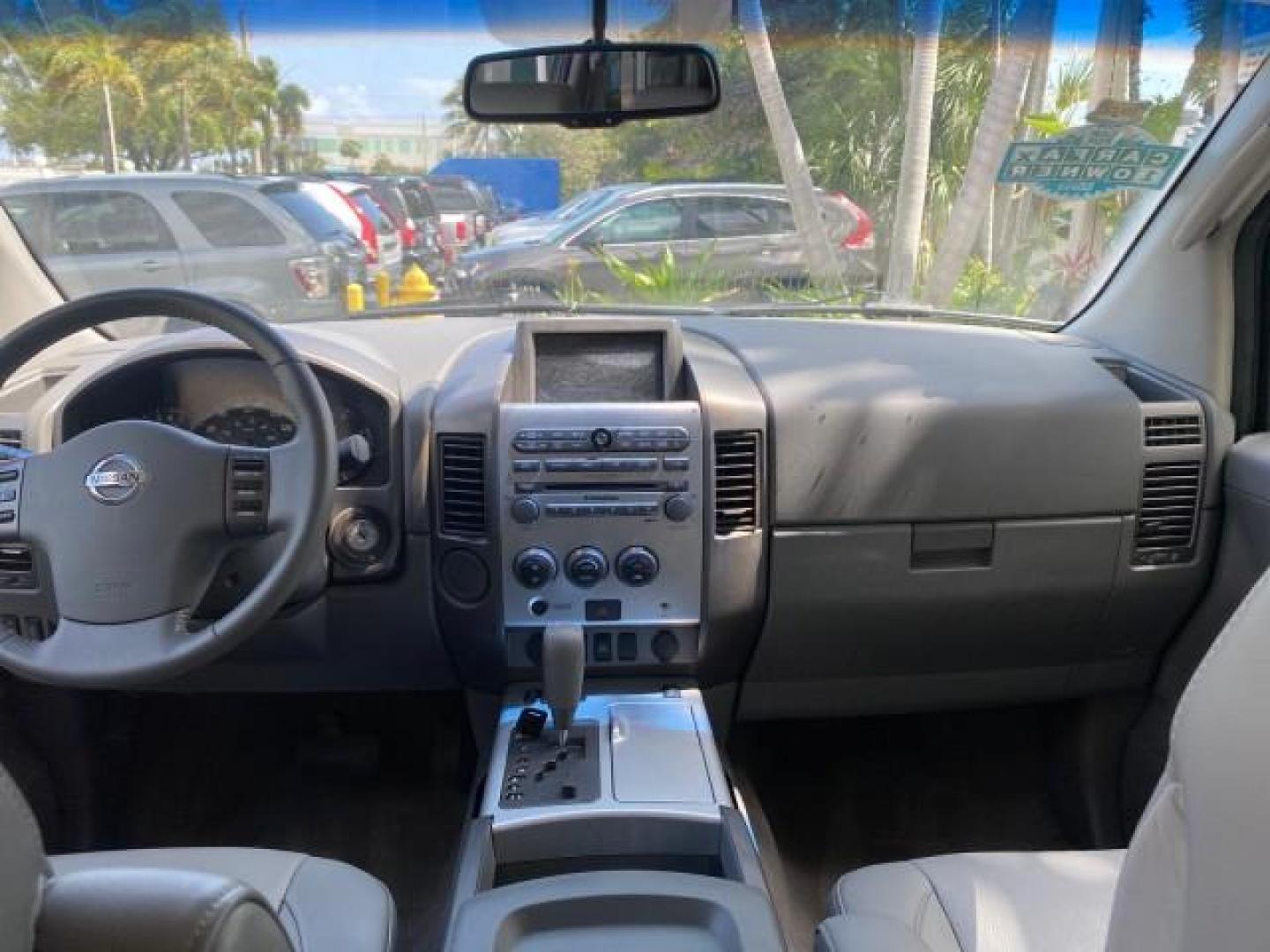 2007 Majestic Blue /Graphite/Titanium Nissan Titan LE 1 OWNER LOW MILES 39,670 CREW CAB (1N6BA07A67N) with an 5.6L DOHC 32-Valve V8 FFV Engine engine, Automatic transmission, located at 4701 North Dixie Hwy, Pompano Beach, FL, 33064, (954) 422-2889, 26.240938, -80.123474 - OUR WEBPAGE FLORIDACARS1.COM HAS OVER 100 PHOTOS AND FREE CARFAX LINK 2007 NISSAN TITAN LE FFV 1 OWNER CREW CAB LEATHER VIN: 1N6BA07A67N215171 1 N 6 B A 0 7 A 6 7 N 2 1 5 1 7 1 CREW PICKUP 5.6L V8 F DOHC 32V FLEX FUEL 19 MPG REAR WHEEL DRIVE Features ABS Brakes Air Conditioning Alloy Wheels AM/FM St - Photo#88