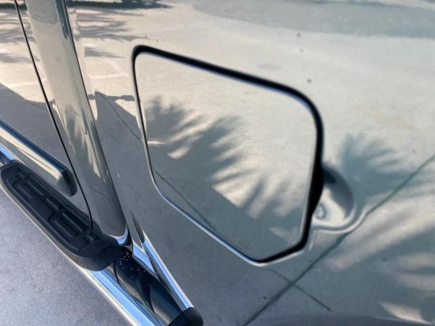 2007 Majestic Blue /Graphite/Titanium Nissan Titan LE 1 OWNER LOW MILES 39,670 CREW CAB (1N6BA07A67N) with an 5.6L DOHC 32-Valve V8 FFV Engine engine, Automatic transmission, located at 4701 North Dixie Hwy, Pompano Beach, FL, 33064, (954) 422-2889, 26.240938, -80.123474 - OUR WEBPAGE FLORIDACARS1.COM HAS OVER 100 PHOTOS AND FREE CARFAX LINK 2007 NISSAN TITAN LE FFV 1 OWNER CREW CAB LEATHER VIN: 1N6BA07A67N215171 1 N 6 B A 0 7 A 6 7 N 2 1 5 1 7 1 CREW PICKUP 5.6L V8 F DOHC 32V FLEX FUEL 19 MPG REAR WHEEL DRIVE Features ABS Brakes Air Conditioning Alloy Wheels AM/FM St - Photo#93