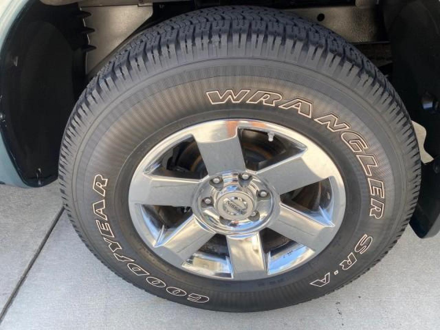 2007 Majestic Blue /Graphite/Titanium Nissan Titan LE 1 OWNER LOW MILES 39,670 CREW CAB (1N6BA07A67N) with an 5.6L DOHC 32-Valve V8 FFV Engine engine, Automatic transmission, located at 4701 North Dixie Hwy, Pompano Beach, FL, 33064, (954) 422-2889, 26.240938, -80.123474 - OUR WEBPAGE FLORIDACARS1.COM HAS OVER 100 PHOTOS AND FREE CARFAX LINK 2007 NISSAN TITAN LE FFV 1 OWNER CREW CAB LEATHER VIN: 1N6BA07A67N215171 1 N 6 B A 0 7 A 6 7 N 2 1 5 1 7 1 CREW PICKUP 5.6L V8 F DOHC 32V FLEX FUEL 19 MPG REAR WHEEL DRIVE Features ABS Brakes Air Conditioning Alloy Wheels AM/FM St - Photo#95