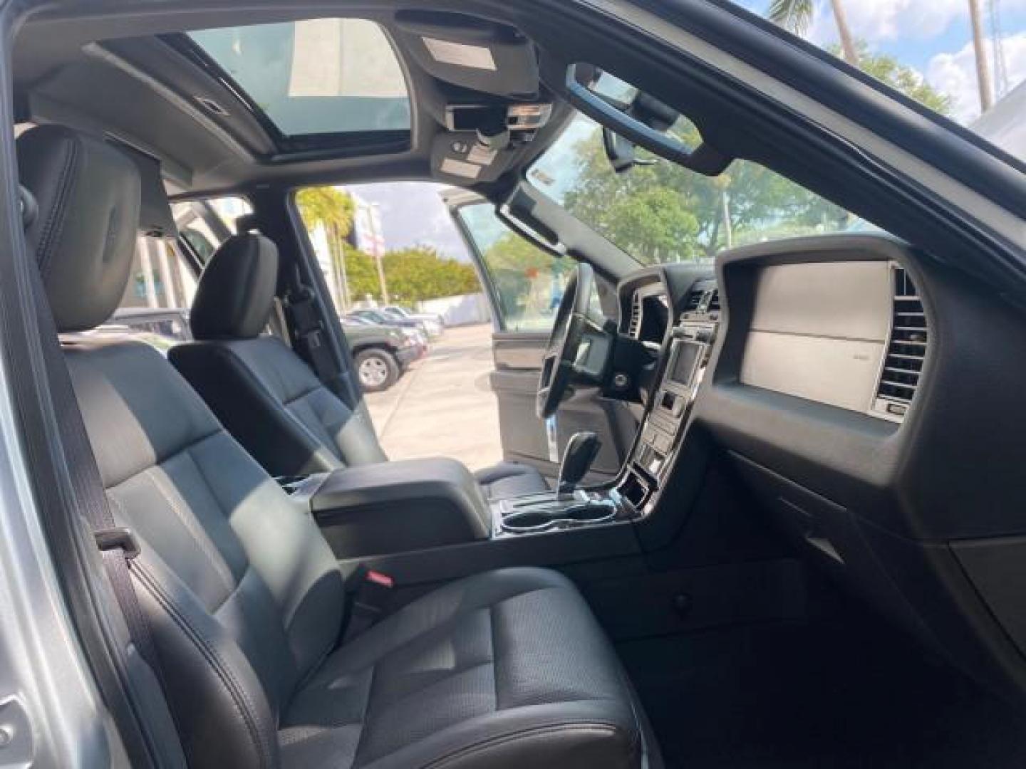 2010 Sterling Gray Metallic /Charcoal Black Lincoln Navigator LOW MILES 49,245 NAV SUNROOF (5LMJJ2H55AE) with an 5.4L SOHC 24-Valve V8 FFV Engine engine, Automatic transmission, located at 4701 North Dixie Hwy, Pompano Beach, FL, 33064, (954) 422-2889, 26.240938, -80.123474 - OUR WEBPAGE FLORIDACARS1.COM HAS OVER 100 PHOTOS AND FREE CARFAX LINK 2010 LINCOLN NAVIGATOR NAVIGATION SUNROOF THIRD ROW VIN: 5LMJJ2H55AEJ04008 5 L M J J 2 H 5 5 A E J 0 4 0 0 8 4 DOOR WAGON/SPORT UTILITY 5.4L V8 F SOHC 24V FLEX FUEL 20 MPG REAR WHEEL DRIVE Features 20 Inch Plus Wheels A/C Seat(s) - Photo#12