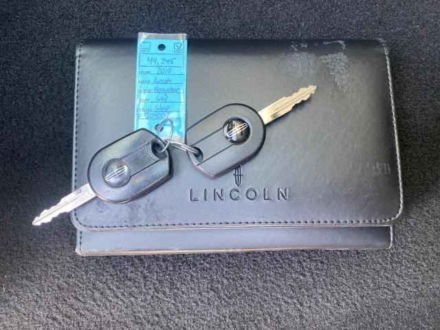 2010 Sterling Gray Metallic /Charcoal Black Lincoln Navigator LOW MILES 49,245 NAV SUNROOF (5LMJJ2H55AE) with an 5.4L SOHC 24-Valve V8 FFV Engine engine, Automatic transmission, located at 4701 North Dixie Hwy, Pompano Beach, FL, 33064, (954) 422-2889, 26.240938, -80.123474 - OUR WEBPAGE FLORIDACARS1.COM HAS OVER 100 PHOTOS AND FREE CARFAX LINK 2010 LINCOLN NAVIGATOR NAVIGATION SUNROOF THIRD ROW VIN: 5LMJJ2H55AEJ04008 5 L M J J 2 H 5 5 A E J 0 4 0 0 8 4 DOOR WAGON/SPORT UTILITY 5.4L V8 F SOHC 24V FLEX FUEL 20 MPG REAR WHEEL DRIVE Features 20 Inch Plus Wheels A/C Seat(s) - Photo#23