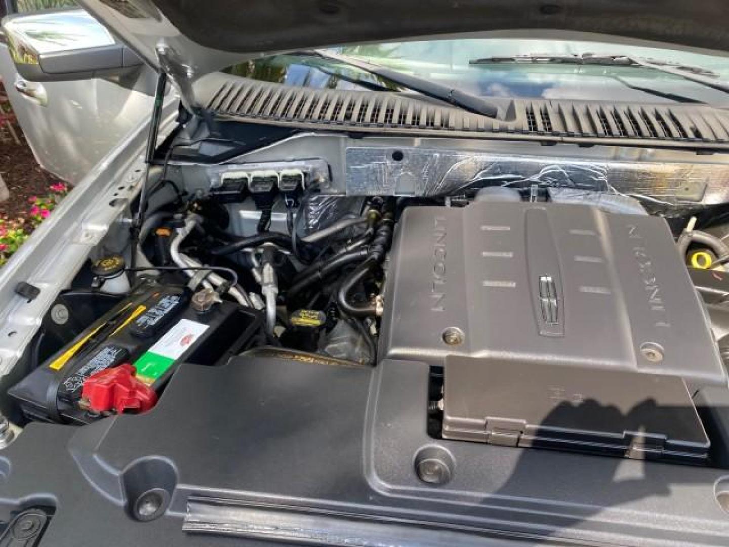 2010 Sterling Gray Metallic /Charcoal Black Lincoln Navigator LOW MILES 49,245 NAV SUNROOF (5LMJJ2H55AE) with an 5.4L SOHC 24-Valve V8 FFV Engine engine, Automatic transmission, located at 4701 North Dixie Hwy, Pompano Beach, FL, 33064, (954) 422-2889, 26.240938, -80.123474 - OUR WEBPAGE FLORIDACARS1.COM HAS OVER 100 PHOTOS AND FREE CARFAX LINK 2010 LINCOLN NAVIGATOR NAVIGATION SUNROOF THIRD ROW VIN: 5LMJJ2H55AEJ04008 5 L M J J 2 H 5 5 A E J 0 4 0 0 8 4 DOOR WAGON/SPORT UTILITY 5.4L V8 F SOHC 24V FLEX FUEL 20 MPG REAR WHEEL DRIVE Features 20 Inch Plus Wheels A/C Seat(s) - Photo#24