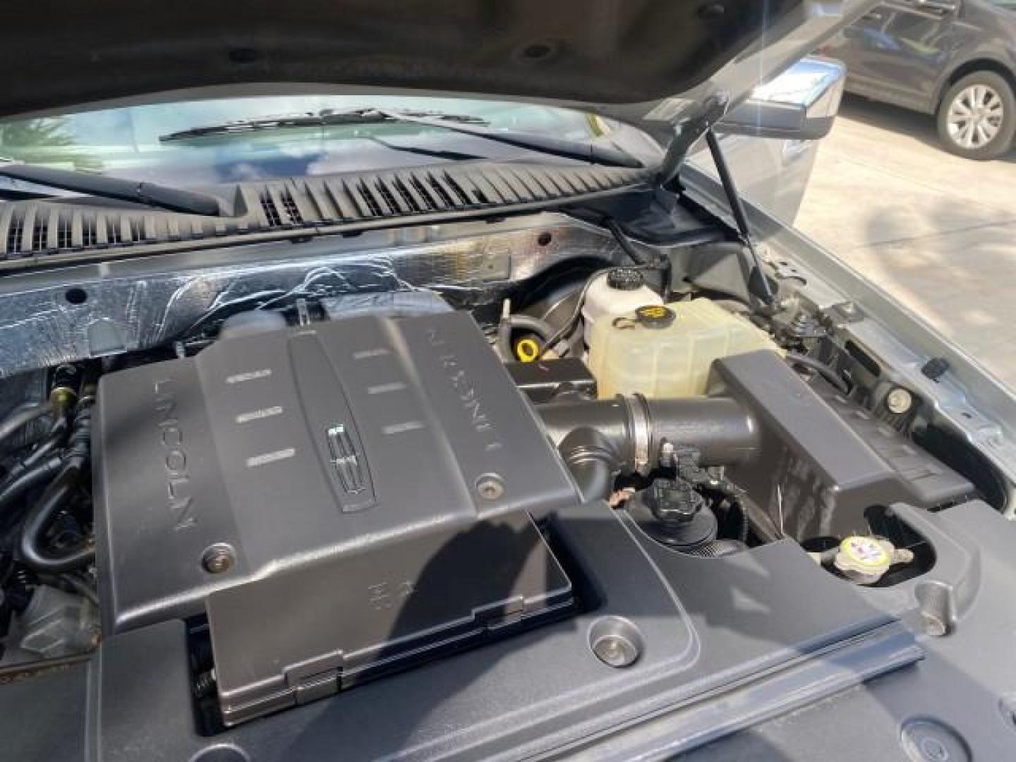 2010 Sterling Gray Metallic /Charcoal Black Lincoln Navigator LOW MILES 49,245 NAV SUNROOF (5LMJJ2H55AE) with an 5.4L SOHC 24-Valve V8 FFV Engine engine, Automatic transmission, located at 4701 North Dixie Hwy, Pompano Beach, FL, 33064, (954) 422-2889, 26.240938, -80.123474 - OUR WEBPAGE FLORIDACARS1.COM HAS OVER 100 PHOTOS AND FREE CARFAX LINK 2010 LINCOLN NAVIGATOR NAVIGATION SUNROOF THIRD ROW VIN: 5LMJJ2H55AEJ04008 5 L M J J 2 H 5 5 A E J 0 4 0 0 8 4 DOOR WAGON/SPORT UTILITY 5.4L V8 F SOHC 24V FLEX FUEL 20 MPG REAR WHEEL DRIVE Features 20 Inch Plus Wheels A/C Seat(s) - Photo#25