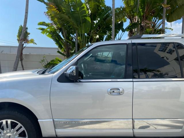 2010 Sterling Gray Metallic /Charcoal Black Lincoln Navigator LOW MILES 49,245 NAV SUNROOF (5LMJJ2H55AE) with an 5.4L SOHC 24-Valve V8 FFV Engine engine, Automatic transmission, located at 4701 North Dixie Hwy, Pompano Beach, FL, 33064, (954) 422-2889, 26.240938, -80.123474 - OUR WEBPAGE FLORIDACARS1.COM HAS OVER 100 PHOTOS AND FREE CARFAX LINK 2010 LINCOLN NAVIGATOR NAVIGATION SUNROOF THIRD ROW VIN: 5LMJJ2H55AEJ04008 5 L M J J 2 H 5 5 A E J 0 4 0 0 8 4 DOOR WAGON/SPORT UTILITY 5.4L V8 F SOHC 24V FLEX FUEL 20 MPG REAR WHEEL DRIVE Features 20 Inch Plus Wheels A/C Seat(s) - Photo#37
