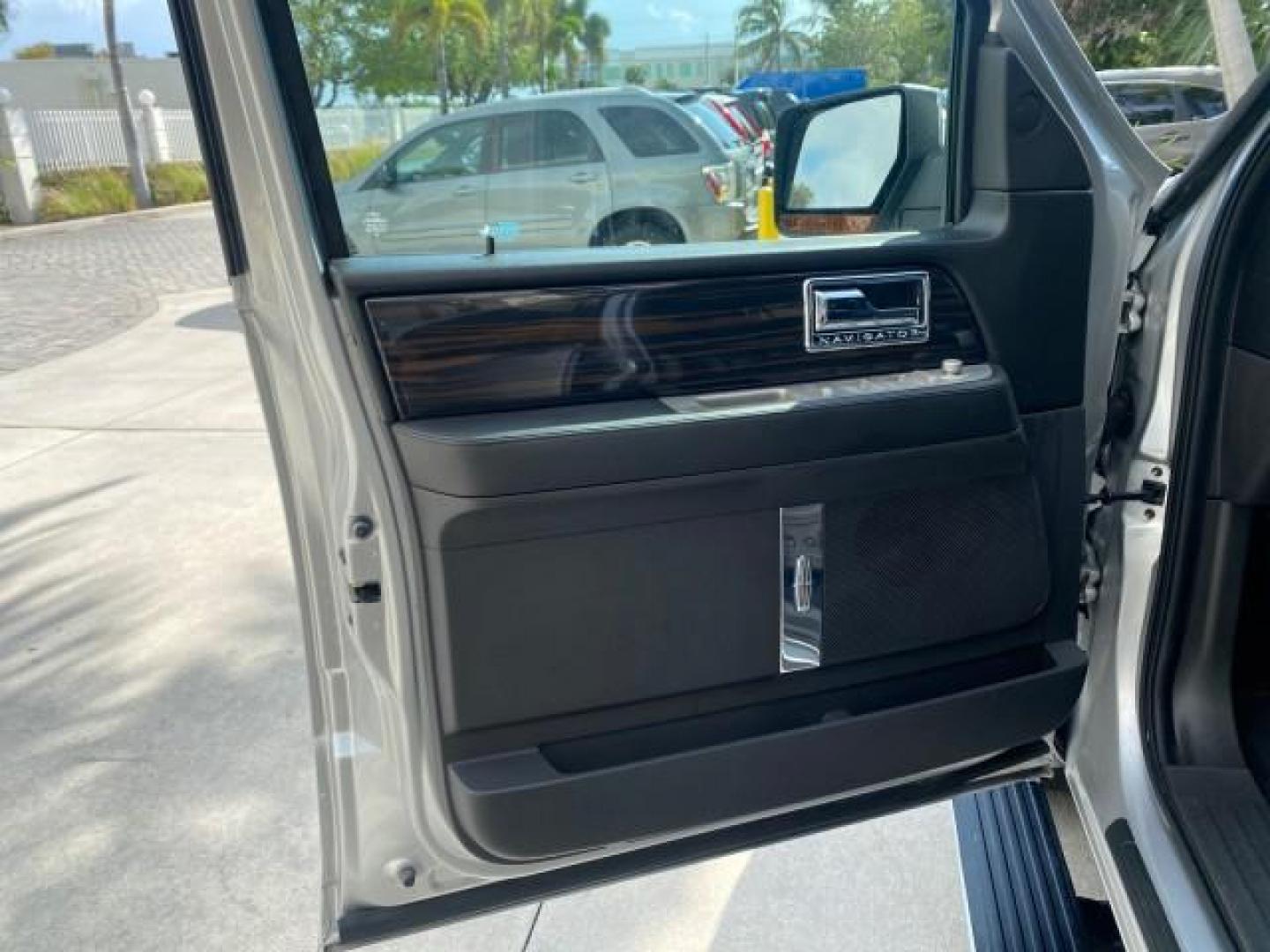 2010 Sterling Gray Metallic /Charcoal Black Lincoln Navigator LOW MILES 49,245 NAV SUNROOF (5LMJJ2H55AE) with an 5.4L SOHC 24-Valve V8 FFV Engine engine, Automatic transmission, located at 4701 North Dixie Hwy, Pompano Beach, FL, 33064, (954) 422-2889, 26.240938, -80.123474 - OUR WEBPAGE FLORIDACARS1.COM HAS OVER 100 PHOTOS AND FREE CARFAX LINK 2010 LINCOLN NAVIGATOR NAVIGATION SUNROOF THIRD ROW VIN: 5LMJJ2H55AEJ04008 5 L M J J 2 H 5 5 A E J 0 4 0 0 8 4 DOOR WAGON/SPORT UTILITY 5.4L V8 F SOHC 24V FLEX FUEL 20 MPG REAR WHEEL DRIVE Features 20 Inch Plus Wheels A/C Seat(s) - Photo#43