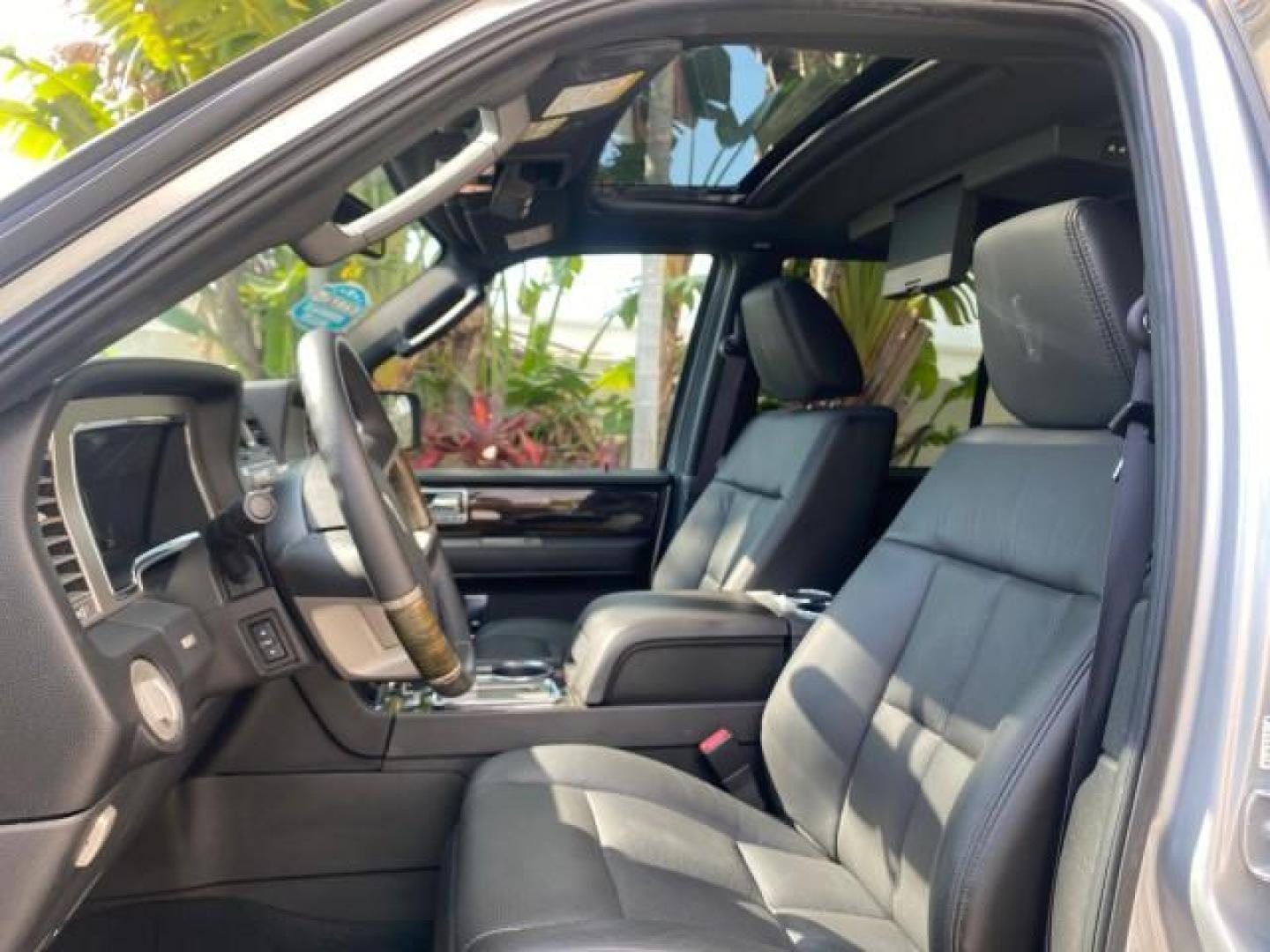 2010 Sterling Gray Metallic /Charcoal Black Lincoln Navigator LOW MILES 49,245 NAV SUNROOF (5LMJJ2H55AE) with an 5.4L SOHC 24-Valve V8 FFV Engine engine, Automatic transmission, located at 4701 North Dixie Hwy, Pompano Beach, FL, 33064, (954) 422-2889, 26.240938, -80.123474 - OUR WEBPAGE FLORIDACARS1.COM HAS OVER 100 PHOTOS AND FREE CARFAX LINK 2010 LINCOLN NAVIGATOR NAVIGATION SUNROOF THIRD ROW VIN: 5LMJJ2H55AEJ04008 5 L M J J 2 H 5 5 A E J 0 4 0 0 8 4 DOOR WAGON/SPORT UTILITY 5.4L V8 F SOHC 24V FLEX FUEL 20 MPG REAR WHEEL DRIVE Features 20 Inch Plus Wheels A/C Seat(s) - Photo#44