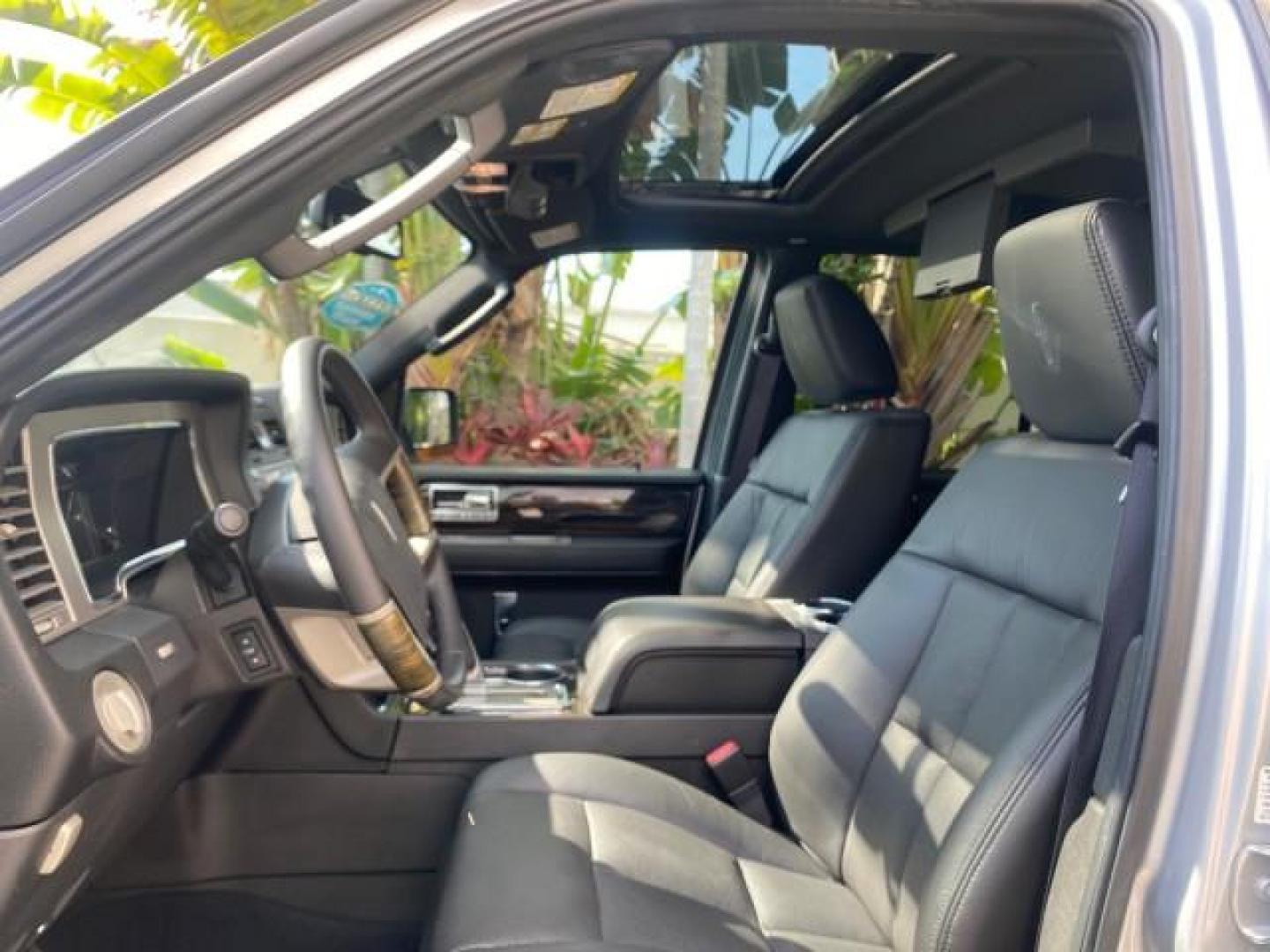 2010 Sterling Gray Metallic /Charcoal Black Lincoln Navigator LOW MILES 49,245 NAV SUNROOF (5LMJJ2H55AE) with an 5.4L SOHC 24-Valve V8 FFV Engine engine, Automatic transmission, located at 4701 North Dixie Hwy, Pompano Beach, FL, 33064, (954) 422-2889, 26.240938, -80.123474 - OUR WEBPAGE FLORIDACARS1.COM HAS OVER 100 PHOTOS AND FREE CARFAX LINK 2010 LINCOLN NAVIGATOR NAVIGATION SUNROOF THIRD ROW VIN: 5LMJJ2H55AEJ04008 5 L M J J 2 H 5 5 A E J 0 4 0 0 8 4 DOOR WAGON/SPORT UTILITY 5.4L V8 F SOHC 24V FLEX FUEL 20 MPG REAR WHEEL DRIVE Features 20 Inch Plus Wheels A/C Seat(s) - Photo#45