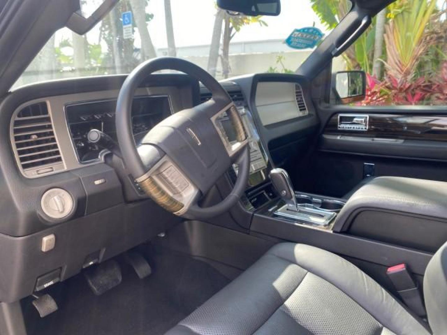 2010 Sterling Gray Metallic /Charcoal Black Lincoln Navigator LOW MILES 49,245 NAV SUNROOF (5LMJJ2H55AE) with an 5.4L SOHC 24-Valve V8 FFV Engine engine, Automatic transmission, located at 4701 North Dixie Hwy, Pompano Beach, FL, 33064, (954) 422-2889, 26.240938, -80.123474 - OUR WEBPAGE FLORIDACARS1.COM HAS OVER 100 PHOTOS AND FREE CARFAX LINK 2010 LINCOLN NAVIGATOR NAVIGATION SUNROOF THIRD ROW VIN: 5LMJJ2H55AEJ04008 5 L M J J 2 H 5 5 A E J 0 4 0 0 8 4 DOOR WAGON/SPORT UTILITY 5.4L V8 F SOHC 24V FLEX FUEL 20 MPG REAR WHEEL DRIVE Features 20 Inch Plus Wheels A/C Seat(s) - Photo#48