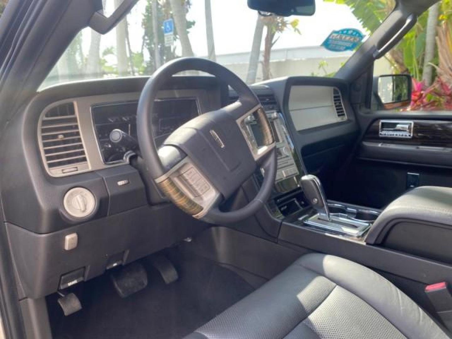 2010 Sterling Gray Metallic /Charcoal Black Lincoln Navigator LOW MILES 49,245 NAV SUNROOF (5LMJJ2H55AE) with an 5.4L SOHC 24-Valve V8 FFV Engine engine, Automatic transmission, located at 4701 North Dixie Hwy, Pompano Beach, FL, 33064, (954) 422-2889, 26.240938, -80.123474 - OUR WEBPAGE FLORIDACARS1.COM HAS OVER 100 PHOTOS AND FREE CARFAX LINK 2010 LINCOLN NAVIGATOR NAVIGATION SUNROOF THIRD ROW VIN: 5LMJJ2H55AEJ04008 5 L M J J 2 H 5 5 A E J 0 4 0 0 8 4 DOOR WAGON/SPORT UTILITY 5.4L V8 F SOHC 24V FLEX FUEL 20 MPG REAR WHEEL DRIVE Features 20 Inch Plus Wheels A/C Seat(s) - Photo#49