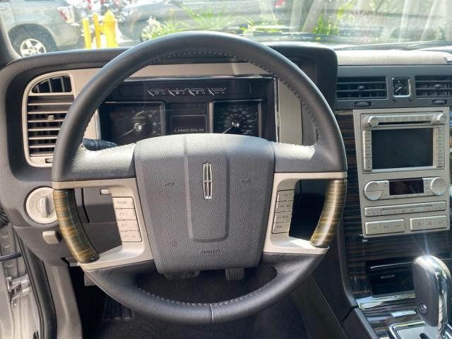 2010 Sterling Gray Metallic /Charcoal Black Lincoln Navigator LOW MILES 49,245 NAV SUNROOF (5LMJJ2H55AE) with an 5.4L SOHC 24-Valve V8 FFV Engine engine, Automatic transmission, located at 4701 North Dixie Hwy, Pompano Beach, FL, 33064, (954) 422-2889, 26.240938, -80.123474 - OUR WEBPAGE FLORIDACARS1.COM HAS OVER 100 PHOTOS AND FREE CARFAX LINK 2010 LINCOLN NAVIGATOR NAVIGATION SUNROOF THIRD ROW VIN: 5LMJJ2H55AEJ04008 5 L M J J 2 H 5 5 A E J 0 4 0 0 8 4 DOOR WAGON/SPORT UTILITY 5.4L V8 F SOHC 24V FLEX FUEL 20 MPG REAR WHEEL DRIVE Features 20 Inch Plus Wheels A/C Seat(s) - Photo#50