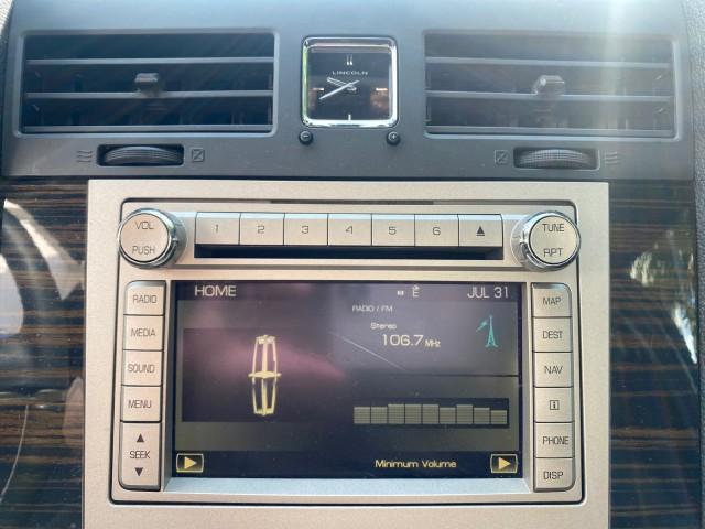 2010 Sterling Gray Metallic /Charcoal Black Lincoln Navigator LOW MILES 49,245 NAV SUNROOF (5LMJJ2H55AE) with an 5.4L SOHC 24-Valve V8 FFV Engine engine, Automatic transmission, located at 4701 North Dixie Hwy, Pompano Beach, FL, 33064, (954) 422-2889, 26.240938, -80.123474 - OUR WEBPAGE FLORIDACARS1.COM HAS OVER 100 PHOTOS AND FREE CARFAX LINK 2010 LINCOLN NAVIGATOR NAVIGATION SUNROOF THIRD ROW VIN: 5LMJJ2H55AEJ04008 5 L M J J 2 H 5 5 A E J 0 4 0 0 8 4 DOOR WAGON/SPORT UTILITY 5.4L V8 F SOHC 24V FLEX FUEL 20 MPG REAR WHEEL DRIVE Features 20 Inch Plus Wheels A/C Seat(s) - Photo#59