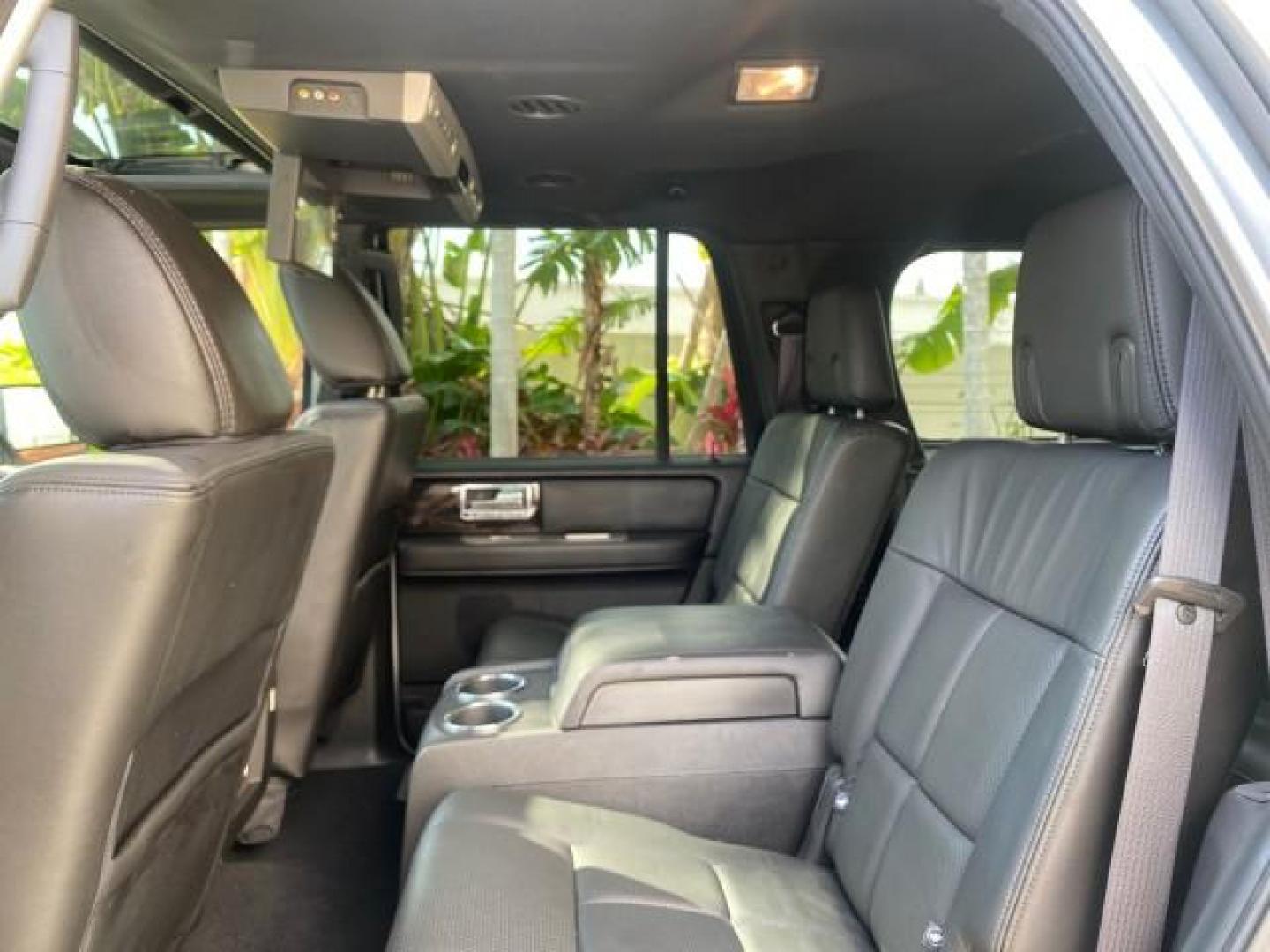 2010 Sterling Gray Metallic /Charcoal Black Lincoln Navigator LOW MILES 49,245 NAV SUNROOF (5LMJJ2H55AE) with an 5.4L SOHC 24-Valve V8 FFV Engine engine, Automatic transmission, located at 4701 North Dixie Hwy, Pompano Beach, FL, 33064, (954) 422-2889, 26.240938, -80.123474 - OUR WEBPAGE FLORIDACARS1.COM HAS OVER 100 PHOTOS AND FREE CARFAX LINK 2010 LINCOLN NAVIGATOR NAVIGATION SUNROOF THIRD ROW VIN: 5LMJJ2H55AEJ04008 5 L M J J 2 H 5 5 A E J 0 4 0 0 8 4 DOOR WAGON/SPORT UTILITY 5.4L V8 F SOHC 24V FLEX FUEL 20 MPG REAR WHEEL DRIVE Features 20 Inch Plus Wheels A/C Seat(s) - Photo#79