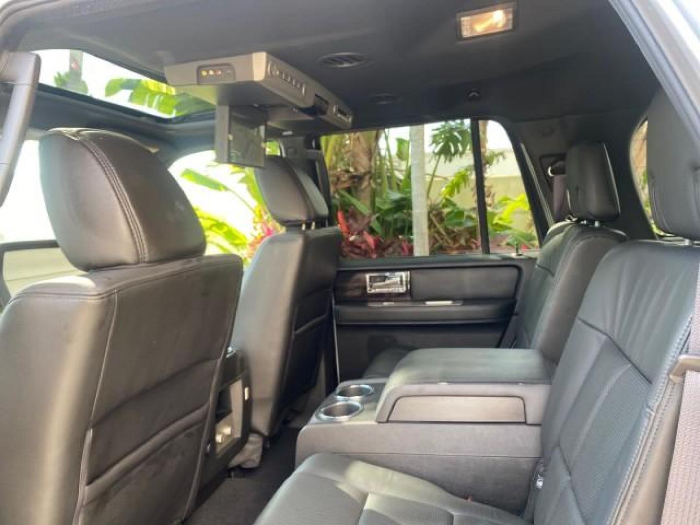 2010 Sterling Gray Metallic /Charcoal Black Lincoln Navigator LOW MILES 49,245 NAV SUNROOF (5LMJJ2H55AE) with an 5.4L SOHC 24-Valve V8 FFV Engine engine, Automatic transmission, located at 4701 North Dixie Hwy, Pompano Beach, FL, 33064, (954) 422-2889, 26.240938, -80.123474 - OUR WEBPAGE FLORIDACARS1.COM HAS OVER 100 PHOTOS AND FREE CARFAX LINK 2010 LINCOLN NAVIGATOR NAVIGATION SUNROOF THIRD ROW VIN: 5LMJJ2H55AEJ04008 5 L M J J 2 H 5 5 A E J 0 4 0 0 8 4 DOOR WAGON/SPORT UTILITY 5.4L V8 F SOHC 24V FLEX FUEL 20 MPG REAR WHEEL DRIVE Features 20 Inch Plus Wheels A/C Seat(s) - Photo#81