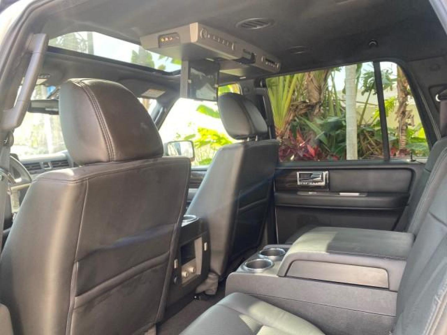 2010 Sterling Gray Metallic /Charcoal Black Lincoln Navigator LOW MILES 49,245 NAV SUNROOF (5LMJJ2H55AE) with an 5.4L SOHC 24-Valve V8 FFV Engine engine, Automatic transmission, located at 4701 North Dixie Hwy, Pompano Beach, FL, 33064, (954) 422-2889, 26.240938, -80.123474 - OUR WEBPAGE FLORIDACARS1.COM HAS OVER 100 PHOTOS AND FREE CARFAX LINK 2010 LINCOLN NAVIGATOR NAVIGATION SUNROOF THIRD ROW VIN: 5LMJJ2H55AEJ04008 5 L M J J 2 H 5 5 A E J 0 4 0 0 8 4 DOOR WAGON/SPORT UTILITY 5.4L V8 F SOHC 24V FLEX FUEL 20 MPG REAR WHEEL DRIVE Features 20 Inch Plus Wheels A/C Seat(s) - Photo#82