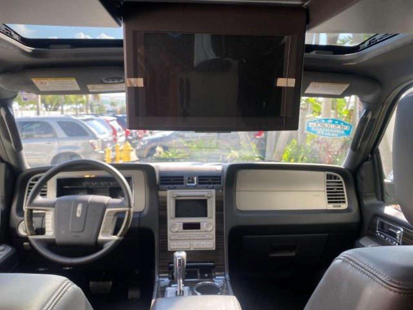 2010 Sterling Gray Metallic /Charcoal Black Lincoln Navigator LOW MILES 49,245 NAV SUNROOF (5LMJJ2H55AE) with an 5.4L SOHC 24-Valve V8 FFV Engine engine, Automatic transmission, located at 4701 North Dixie Hwy, Pompano Beach, FL, 33064, (954) 422-2889, 26.240938, -80.123474 - OUR WEBPAGE FLORIDACARS1.COM HAS OVER 100 PHOTOS AND FREE CARFAX LINK 2010 LINCOLN NAVIGATOR NAVIGATION SUNROOF THIRD ROW VIN: 5LMJJ2H55AEJ04008 5 L M J J 2 H 5 5 A E J 0 4 0 0 8 4 DOOR WAGON/SPORT UTILITY 5.4L V8 F SOHC 24V FLEX FUEL 20 MPG REAR WHEEL DRIVE Features 20 Inch Plus Wheels A/C Seat(s) - Photo#91