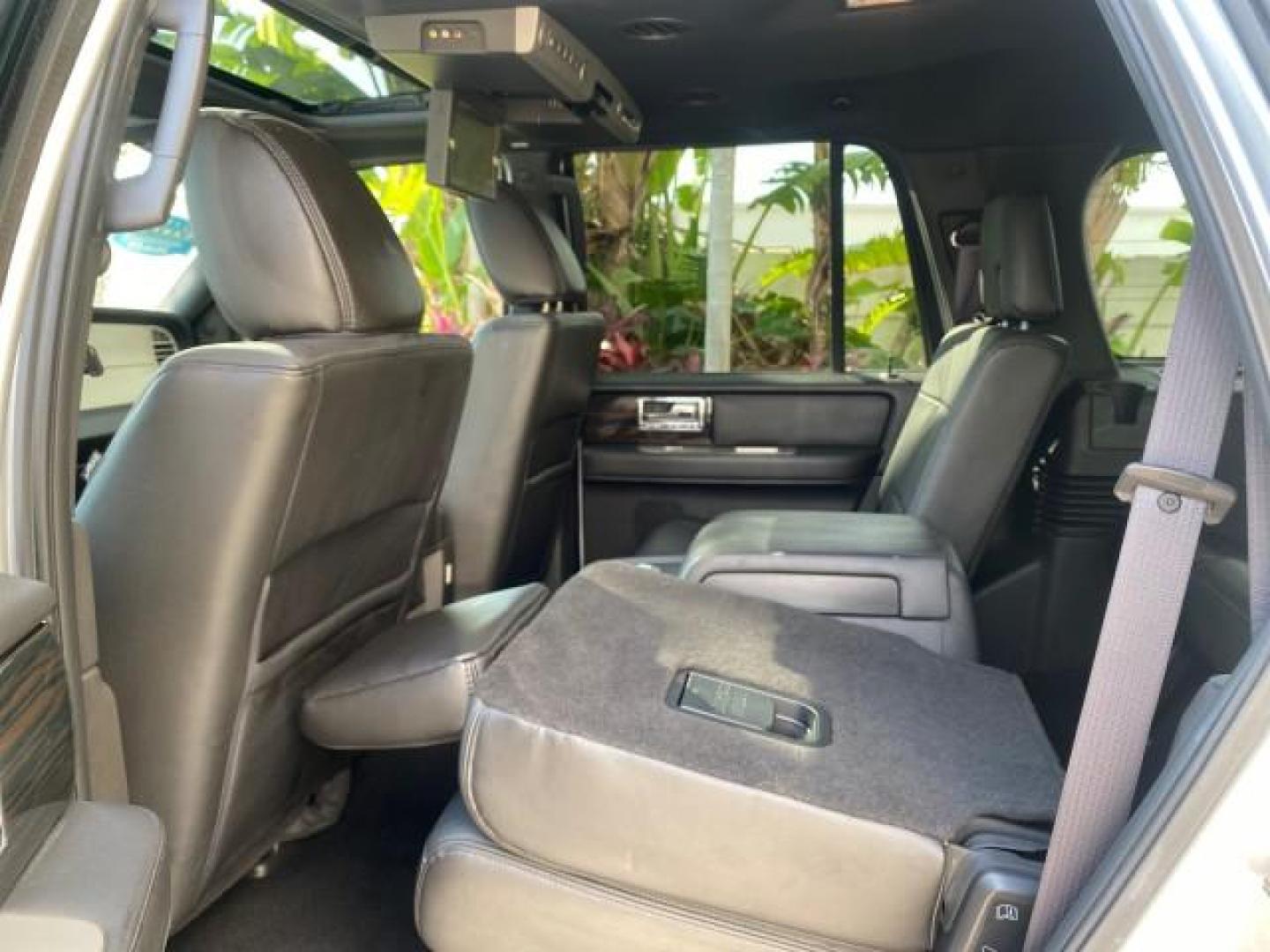 2010 Sterling Gray Metallic /Charcoal Black Lincoln Navigator LOW MILES 49,245 NAV SUNROOF (5LMJJ2H55AE) with an 5.4L SOHC 24-Valve V8 FFV Engine engine, Automatic transmission, located at 4701 North Dixie Hwy, Pompano Beach, FL, 33064, (954) 422-2889, 26.240938, -80.123474 - OUR WEBPAGE FLORIDACARS1.COM HAS OVER 100 PHOTOS AND FREE CARFAX LINK 2010 LINCOLN NAVIGATOR NAVIGATION SUNROOF THIRD ROW VIN: 5LMJJ2H55AEJ04008 5 L M J J 2 H 5 5 A E J 0 4 0 0 8 4 DOOR WAGON/SPORT UTILITY 5.4L V8 F SOHC 24V FLEX FUEL 20 MPG REAR WHEEL DRIVE Features 20 Inch Plus Wheels A/C Seat(s) - Photo#93