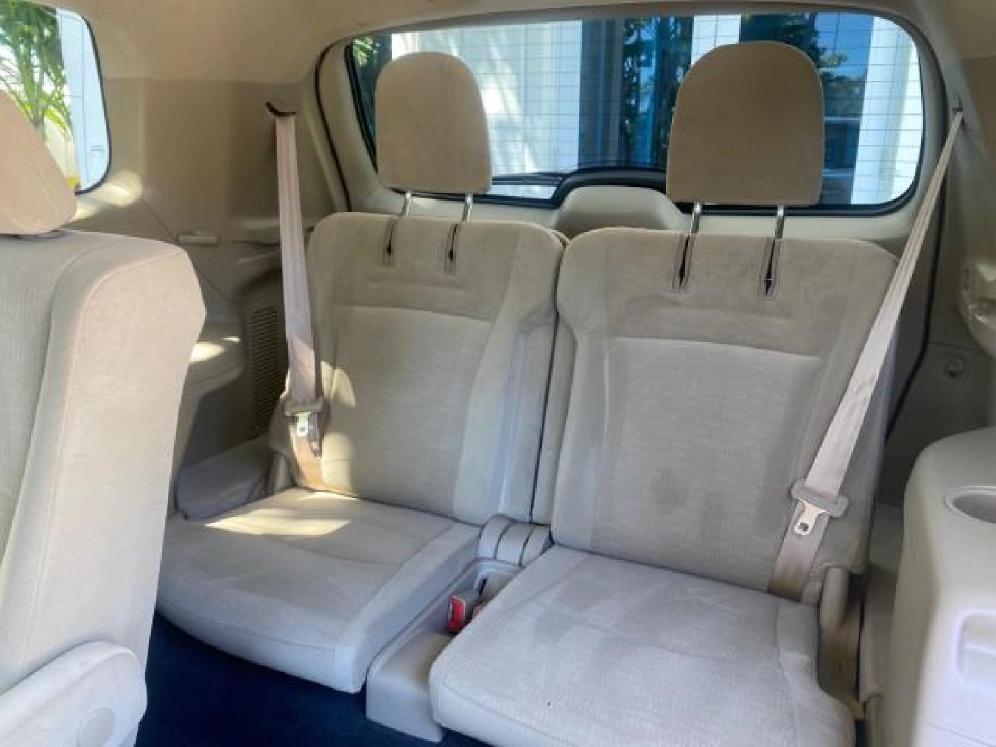 2013 Blizzard Pearl /Sand Beige Toyota Highlander Plus LOW MILES 42,200 1 OWNER (5TDZK3EH5DS) with an 3.5L DOHC 24-Valve VVT-i V6 Engine engine, Automatic transmission, located at 4701 North Dixie Hwy, Pompano Beach, FL, 33064, (954) 422-2889, 26.240938, -80.123474 - OUR WEBPAGE FLORIDACARS1.COM HAS OVER 100 PHOTOS AND FREE CARFAX LINK 2013 Toyota Highlander Plus 1 OWNER NEW $30,474 VIN: 5TDZK3EH5DS095210 4 Door Wagon/Sport Utility 3.5L V6 F DOHC 24V Gasoline Front Wheel Drive Features ABS Brakes Air Conditioning Alloy Wheels AM/FM Stereo Automatic Transmission - Photo#86