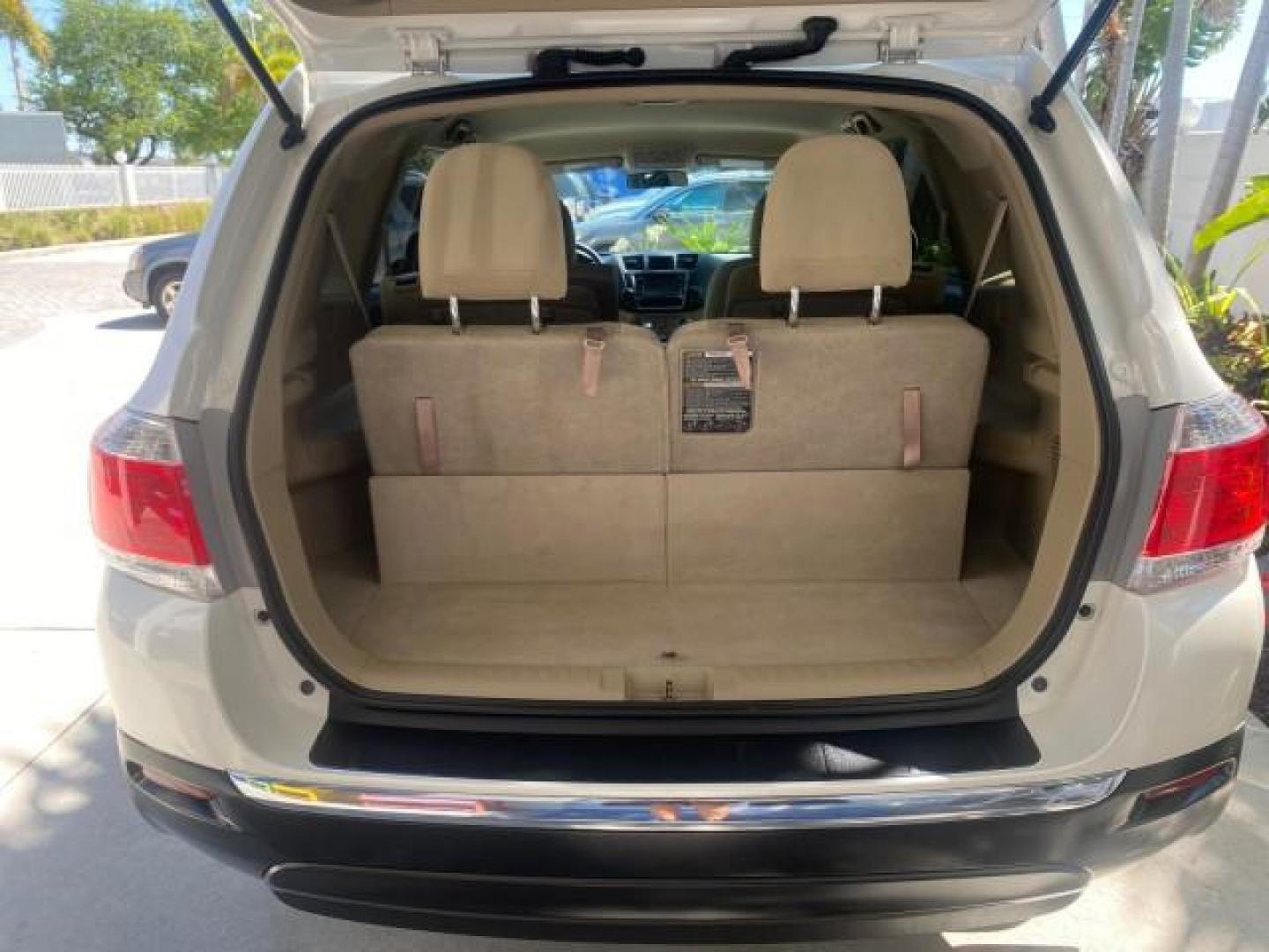 2013 Blizzard Pearl /Sand Beige Toyota Highlander Plus LOW MILES 42,200 1 OWNER (5TDZK3EH5DS) with an 3.5L DOHC 24-Valve VVT-i V6 Engine engine, Automatic transmission, located at 4701 North Dixie Hwy, Pompano Beach, FL, 33064, (954) 422-2889, 26.240938, -80.123474 - OUR WEBPAGE FLORIDACARS1.COM HAS OVER 100 PHOTOS AND FREE CARFAX LINK 2013 Toyota Highlander Plus 1 OWNER NEW $30,474 VIN: 5TDZK3EH5DS095210 4 Door Wagon/Sport Utility 3.5L V6 F DOHC 24V Gasoline Front Wheel Drive Features ABS Brakes Air Conditioning Alloy Wheels AM/FM Stereo Automatic Transmission - Photo#97