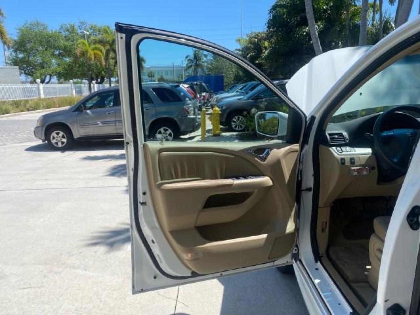 2010 Taffeta White /Ivory Honda Odyssey EX-L LOW MILES 58,506 1 OWNER BRAUN (5FNRL3H68AB) with an 3.5L SOHC MPFI 24-Valve i-VTEC V6 Engine engine, Automatic transmission, located at 4701 North Dixie Hwy, Pompano Beach, FL, 33064, (954) 422-2889, 26.240938, -80.123474 - OUR WEBPAGE FLORIDACARS1.COM HAS OVER 100 PHOTOS AND FREE CARFAX LINK 2010 HONDA ODYSSEY EX-L 1 OWNER BRAUN HANDICAP CONVERSION VAN NEW $33,544 VIN: 5FNRL3H68AB090445 5 F N R L 3 H 6 8 A B 0 9 0 4 4 5 VAN 3.5L V6 F SOHC 24V GASOLINE 25 MPG FRONT WHEEL DRIVE Features ABS Brakes Air Conditioning Alloy- Photo#9