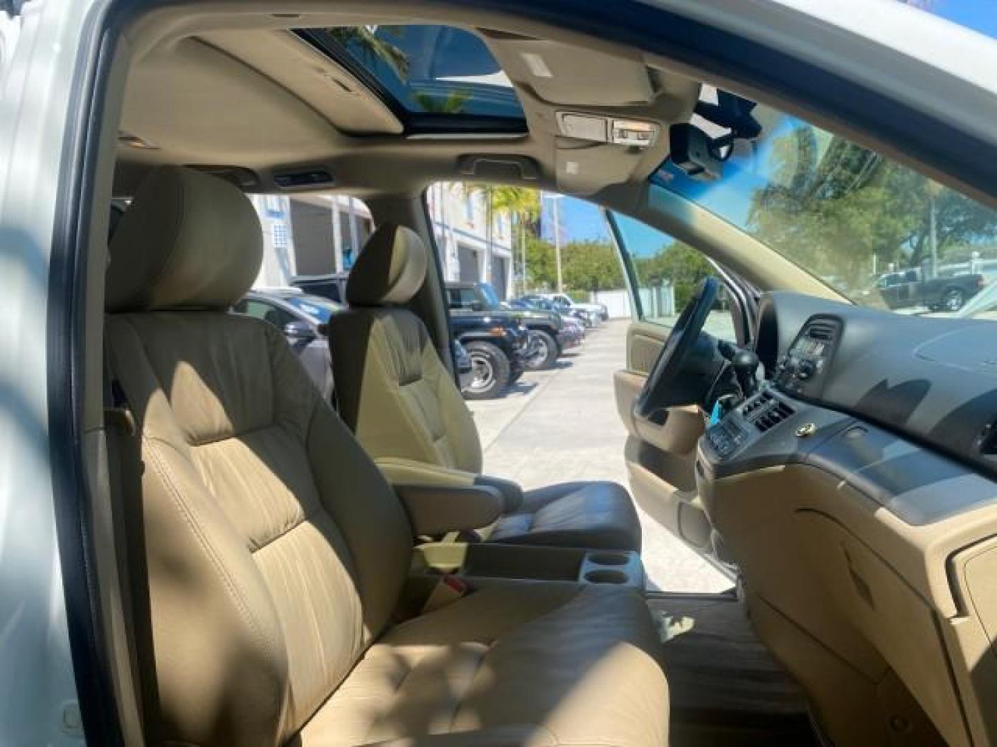 2010 Taffeta White /Ivory Honda Odyssey EX-L LOW MILES 58,506 1 OWNER BRAUN (5FNRL3H68AB) with an 3.5L SOHC MPFI 24-Valve i-VTEC V6 Engine engine, Automatic transmission, located at 4701 North Dixie Hwy, Pompano Beach, FL, 33064, (954) 422-2889, 26.240938, -80.123474 - OUR WEBPAGE FLORIDACARS1.COM HAS OVER 100 PHOTOS AND FREE CARFAX LINK 2010 HONDA ODYSSEY EX-L 1 OWNER BRAUN HANDICAP CONVERSION VAN NEW $33,544 VIN: 5FNRL3H68AB090445 5 F N R L 3 H 6 8 A B 0 9 0 4 4 5 VAN 3.5L V6 F SOHC 24V GASOLINE 25 MPG FRONT WHEEL DRIVE Features ABS Brakes Air Conditioning Alloy- Photo#12