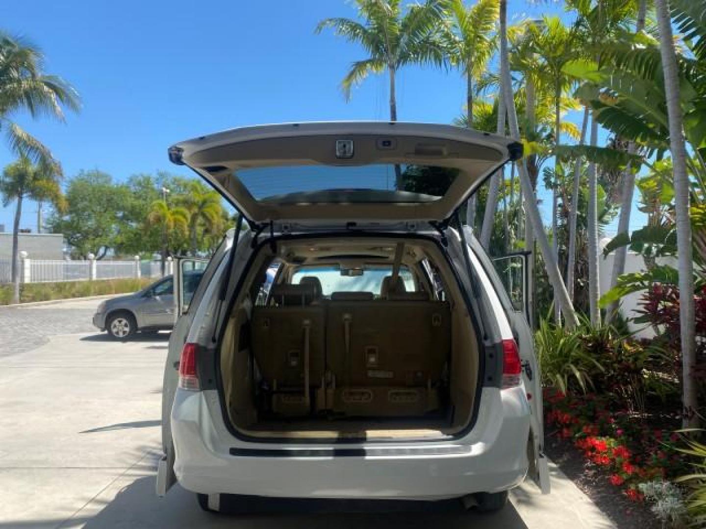2010 Taffeta White /Ivory Honda Odyssey EX-L LOW MILES 58,506 1 OWNER BRAUN (5FNRL3H68AB) with an 3.5L SOHC MPFI 24-Valve i-VTEC V6 Engine engine, Automatic transmission, located at 4701 North Dixie Hwy, Pompano Beach, FL, 33064, (954) 422-2889, 26.240938, -80.123474 - OUR WEBPAGE FLORIDACARS1.COM HAS OVER 100 PHOTOS AND FREE CARFAX LINK 2010 HONDA ODYSSEY EX-L 1 OWNER BRAUN HANDICAP CONVERSION VAN NEW $33,544 VIN: 5FNRL3H68AB090445 5 F N R L 3 H 6 8 A B 0 9 0 4 4 5 VAN 3.5L V6 F SOHC 24V GASOLINE 25 MPG FRONT WHEEL DRIVE Features ABS Brakes Air Conditioning Alloy- Photo#14