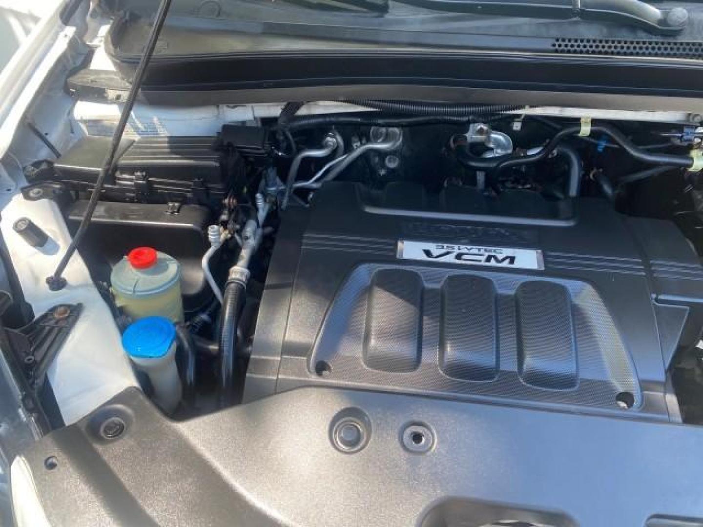2010 Taffeta White /Ivory Honda Odyssey EX-L LOW MILES 58,506 1 OWNER BRAUN (5FNRL3H68AB) with an 3.5L SOHC MPFI 24-Valve i-VTEC V6 Engine engine, Automatic transmission, located at 4701 North Dixie Hwy, Pompano Beach, FL, 33064, (954) 422-2889, 26.240938, -80.123474 - OUR WEBPAGE FLORIDACARS1.COM HAS OVER 100 PHOTOS AND FREE CARFAX LINK 2010 HONDA ODYSSEY EX-L 1 OWNER BRAUN HANDICAP CONVERSION VAN NEW $33,544 VIN: 5FNRL3H68AB090445 5 F N R L 3 H 6 8 A B 0 9 0 4 4 5 VAN 3.5L V6 F SOHC 24V GASOLINE 25 MPG FRONT WHEEL DRIVE Features ABS Brakes Air Conditioning Alloy- Photo#23