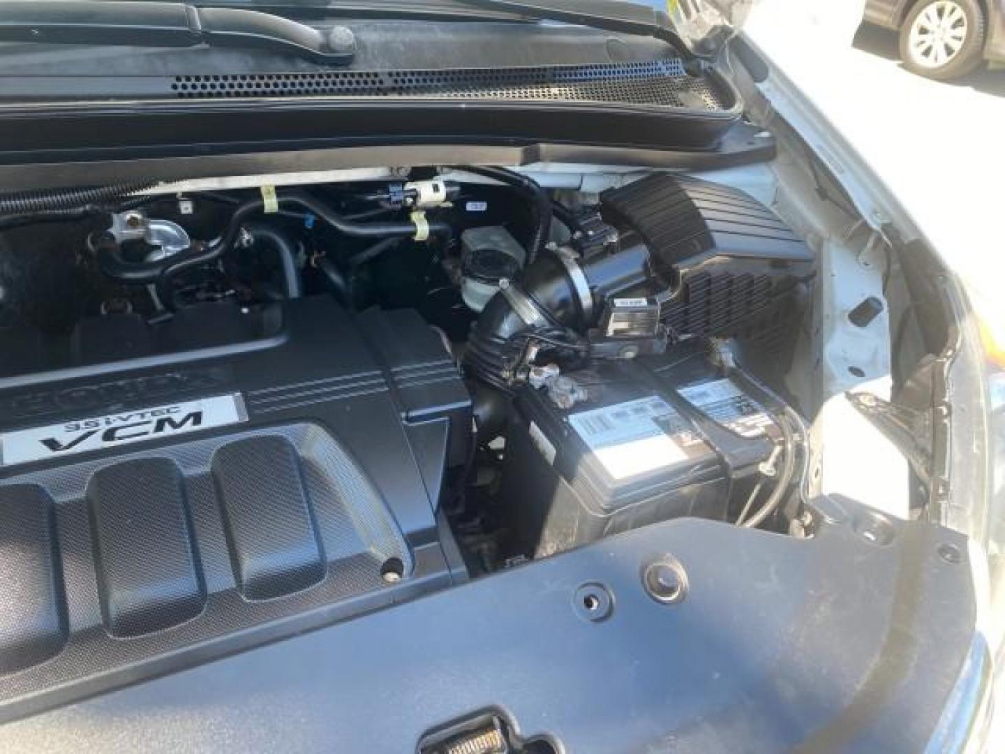 2010 Taffeta White /Ivory Honda Odyssey EX-L LOW MILES 58,506 1 OWNER BRAUN (5FNRL3H68AB) with an 3.5L SOHC MPFI 24-Valve i-VTEC V6 Engine engine, Automatic transmission, located at 4701 North Dixie Hwy, Pompano Beach, FL, 33064, (954) 422-2889, 26.240938, -80.123474 - OUR WEBPAGE FLORIDACARS1.COM HAS OVER 100 PHOTOS AND FREE CARFAX LINK 2010 HONDA ODYSSEY EX-L 1 OWNER BRAUN HANDICAP CONVERSION VAN NEW $33,544 VIN: 5FNRL3H68AB090445 5 F N R L 3 H 6 8 A B 0 9 0 4 4 5 VAN 3.5L V6 F SOHC 24V GASOLINE 25 MPG FRONT WHEEL DRIVE Features ABS Brakes Air Conditioning Alloy- Photo#24