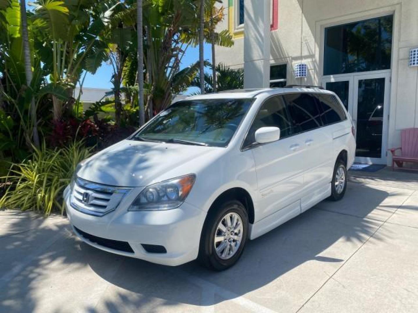 2010 Taffeta White /Ivory Honda Odyssey EX-L LOW MILES 58,506 1 OWNER BRAUN (5FNRL3H68AB) with an 3.5L SOHC MPFI 24-Valve i-VTEC V6 Engine engine, Automatic transmission, located at 4701 North Dixie Hwy, Pompano Beach, FL, 33064, (954) 422-2889, 26.240938, -80.123474 - OUR WEBPAGE FLORIDACARS1.COM HAS OVER 100 PHOTOS AND FREE CARFAX LINK 2010 HONDA ODYSSEY EX-L 1 OWNER BRAUN HANDICAP CONVERSION VAN NEW $33,544 VIN: 5FNRL3H68AB090445 5 F N R L 3 H 6 8 A B 0 9 0 4 4 5 VAN 3.5L V6 F SOHC 24V GASOLINE 25 MPG FRONT WHEEL DRIVE Features ABS Brakes Air Conditioning Alloy- Photo#27